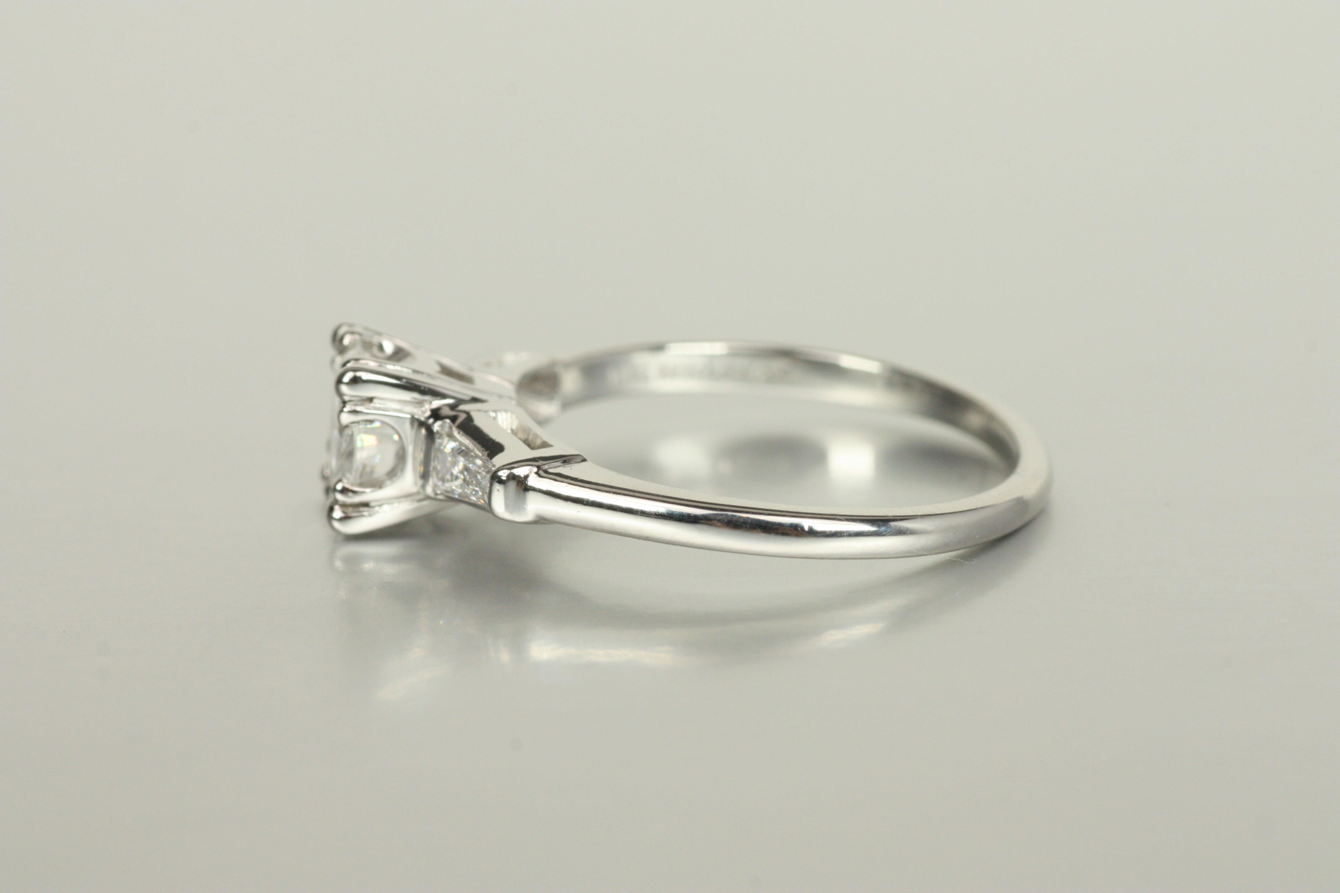 Women's 1950s 3-Stone Engagement Ring – 0.84ct Round & Baguette Diamonds in Platinum For Sale