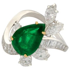 1950s 3.23 Carat Emerald and 3.91 Carat Diamond Platinum Cocktail Ring