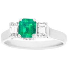 1950s .56 Carat Emerald and Diamond-Set Platinum Ring