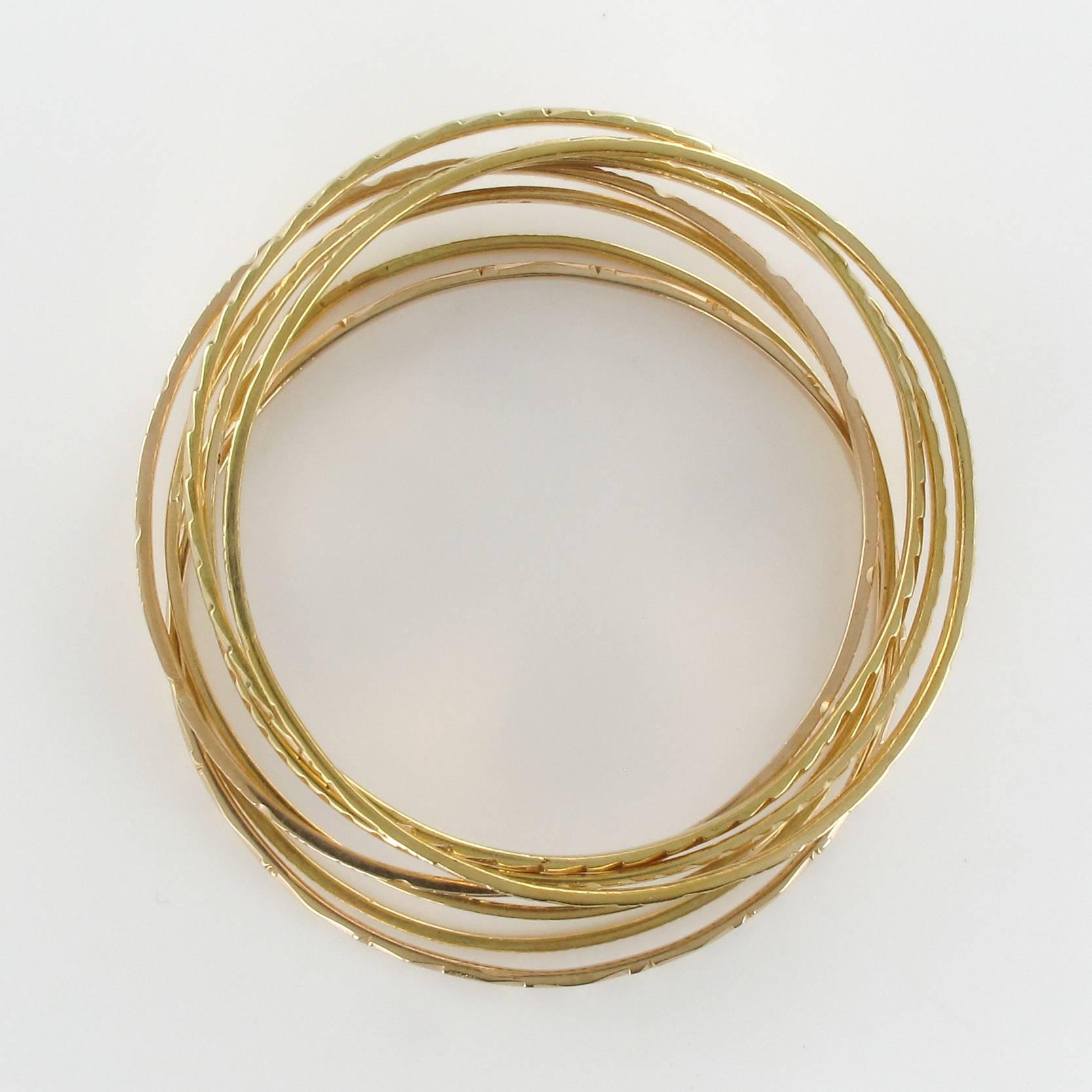 1950s 7-Day 18 Karat Yellow Gold Bangle Bracelet In New Condition In Poitiers, FR