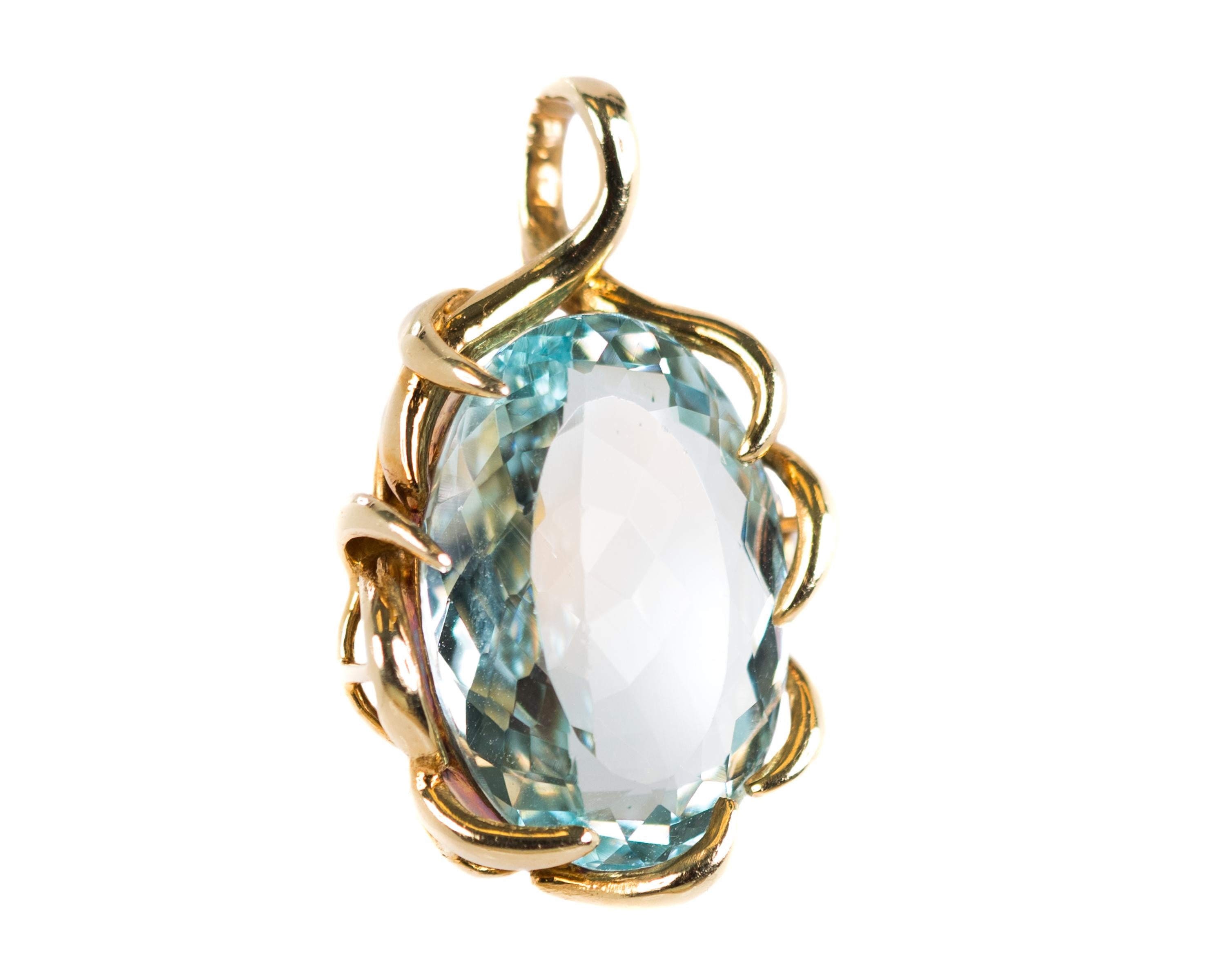 1950s Retro Oval cut Aquamarine Pendant - 14 Karat Yellow Gold, Aquamarine

Features:
8.0 carat Aquamarine oval cut Center Stone
14 Karat Yellow Gold, Ornate 7-Prong Setting
Open Gallery and Back
Elevated Setting
Dimensions: 30 x 18 millimeters