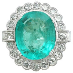 1950s 8.19 Carat Emerald and 1.48 Carat Diamond White Gold Cocktail Ring