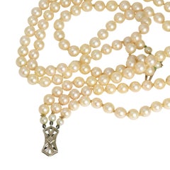 1950's 9k Gold Lotus Cultured Pearl Three-Strand Necklace, Circa 1958