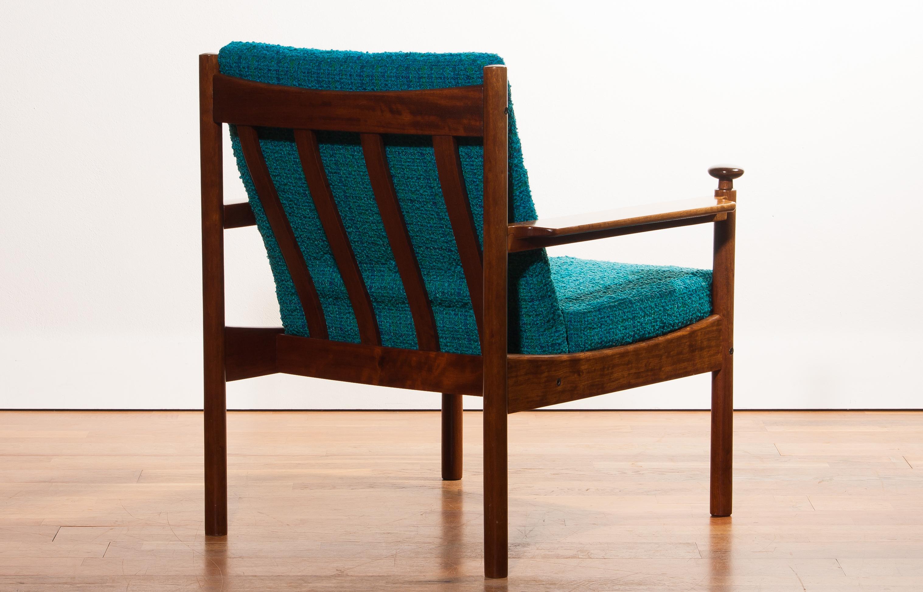 Beautiful chairs designed by Torbjørn Afdal for Sandvik & Co. Mobler, Norway.
The wooden frame with the blue fabric cushions makes it a very nice combination.
The condition, wear consistent with age and use.
Period 1950s
Dimensions: H 83 cm, W