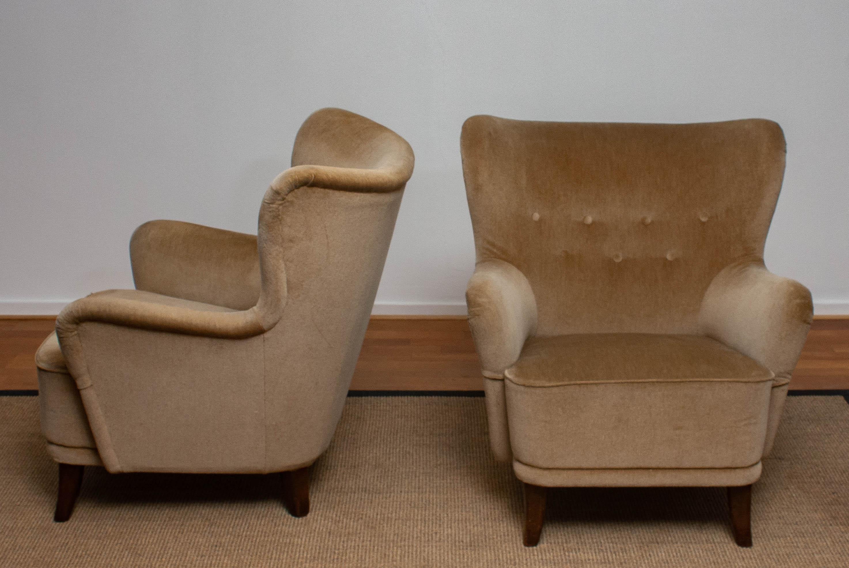 Mid-Century Modern 1950s a Pair of Lounge Easy Club Chairs by Ilmari Lappalainen for Asko, Finland