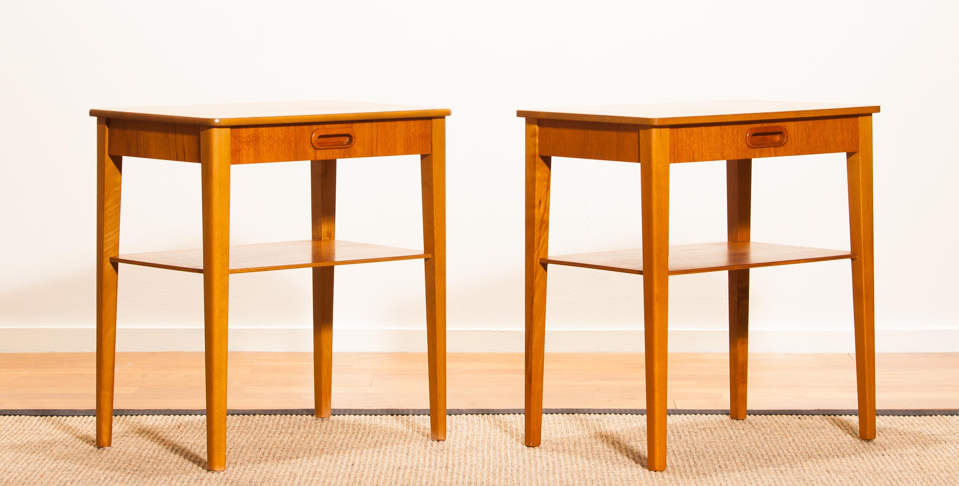 Beautiful pair of bedside tables by Björkås Möbelfabrik, Sweden.
They are made of teak, with single drawer and magazine shelf.
The tables are in a very nice condition.
Period 1950s
Dimensions H 50 cm, W 45 cm, D 32 cm.