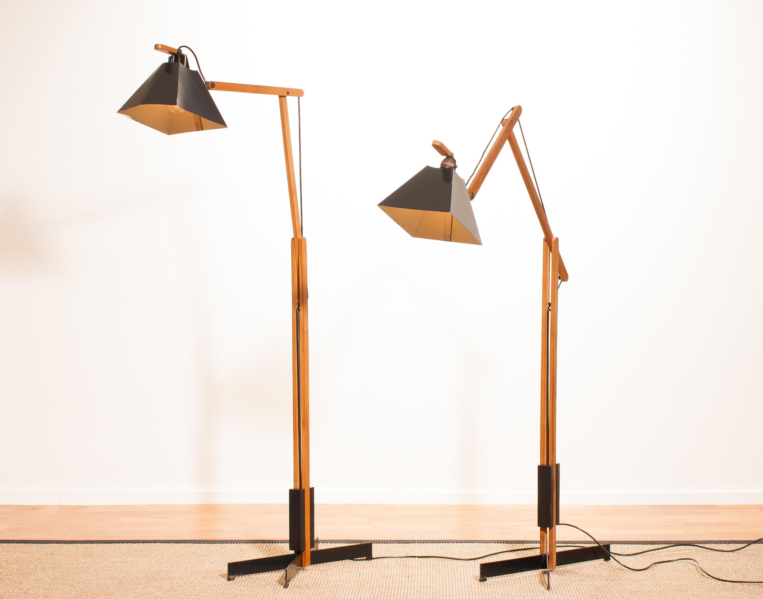 Swedish 1950s, a Pair of Very Rare Teak and Metal Floor Lamps by Luxus