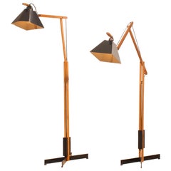 1950s, a Pair of Very Rare Teak and Metal Floor Lamps by Luxus