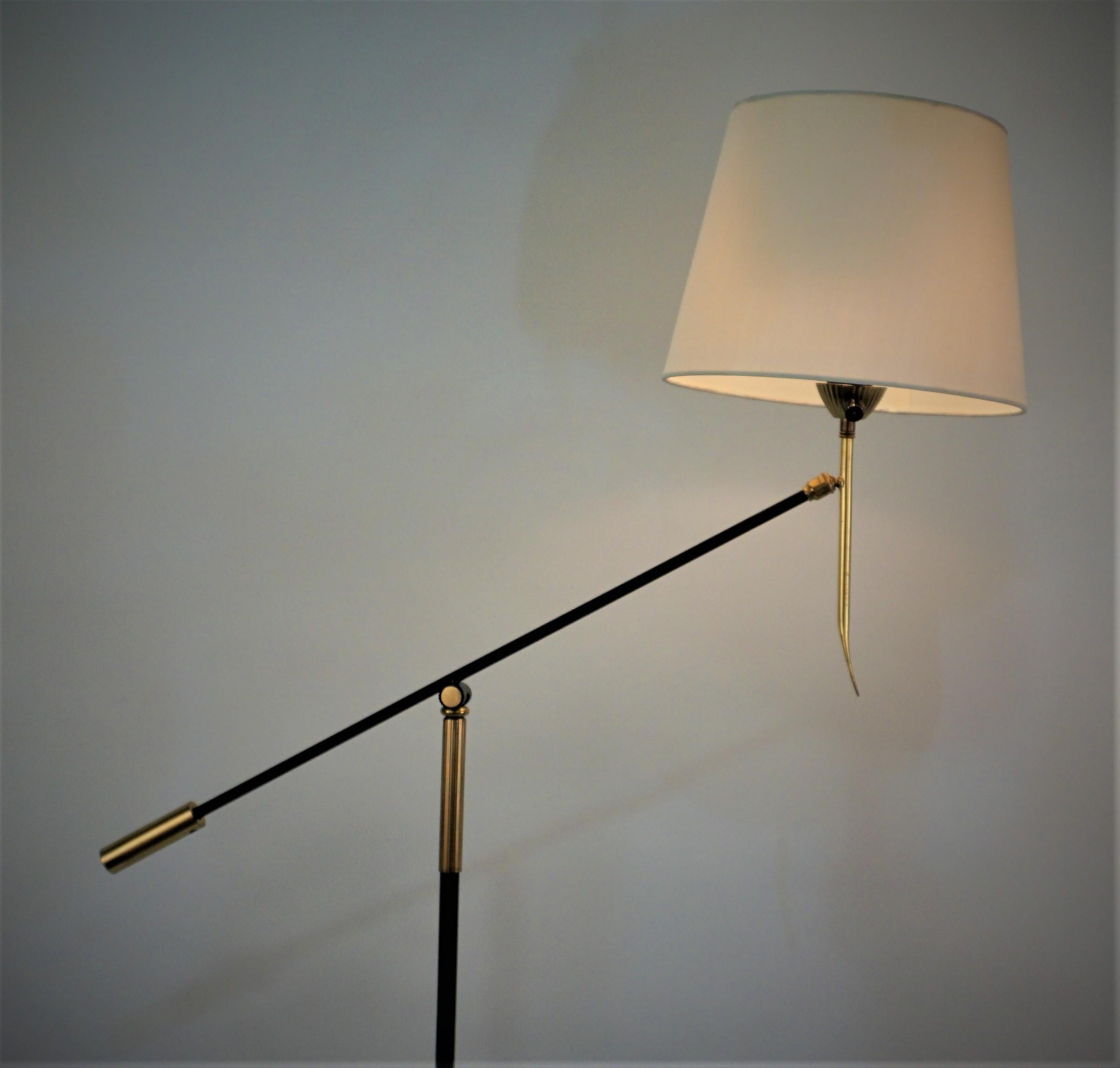 French 1950's adjustable floor lamp, black lacquer on steel and bronze with replacement silk hardback lampshade.