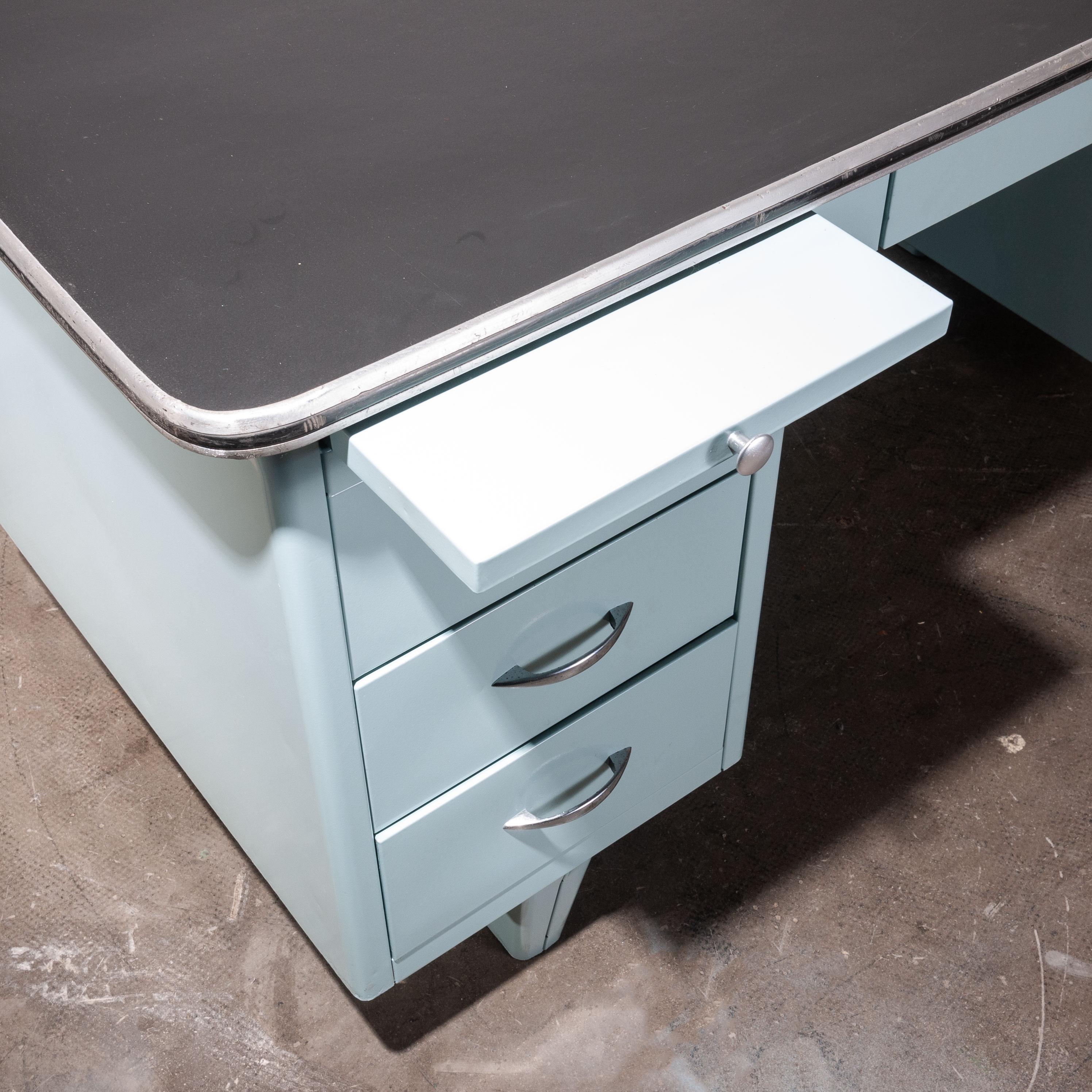 1950s vintage Air Force blue metal desk with Forbo linoleum top. This stunning desk came from the RAF Linton-on-Ouse base in North Yorkshire. After a rather hard life we have restored it to its former glory and fitted a new Forbo linoleum top. We
