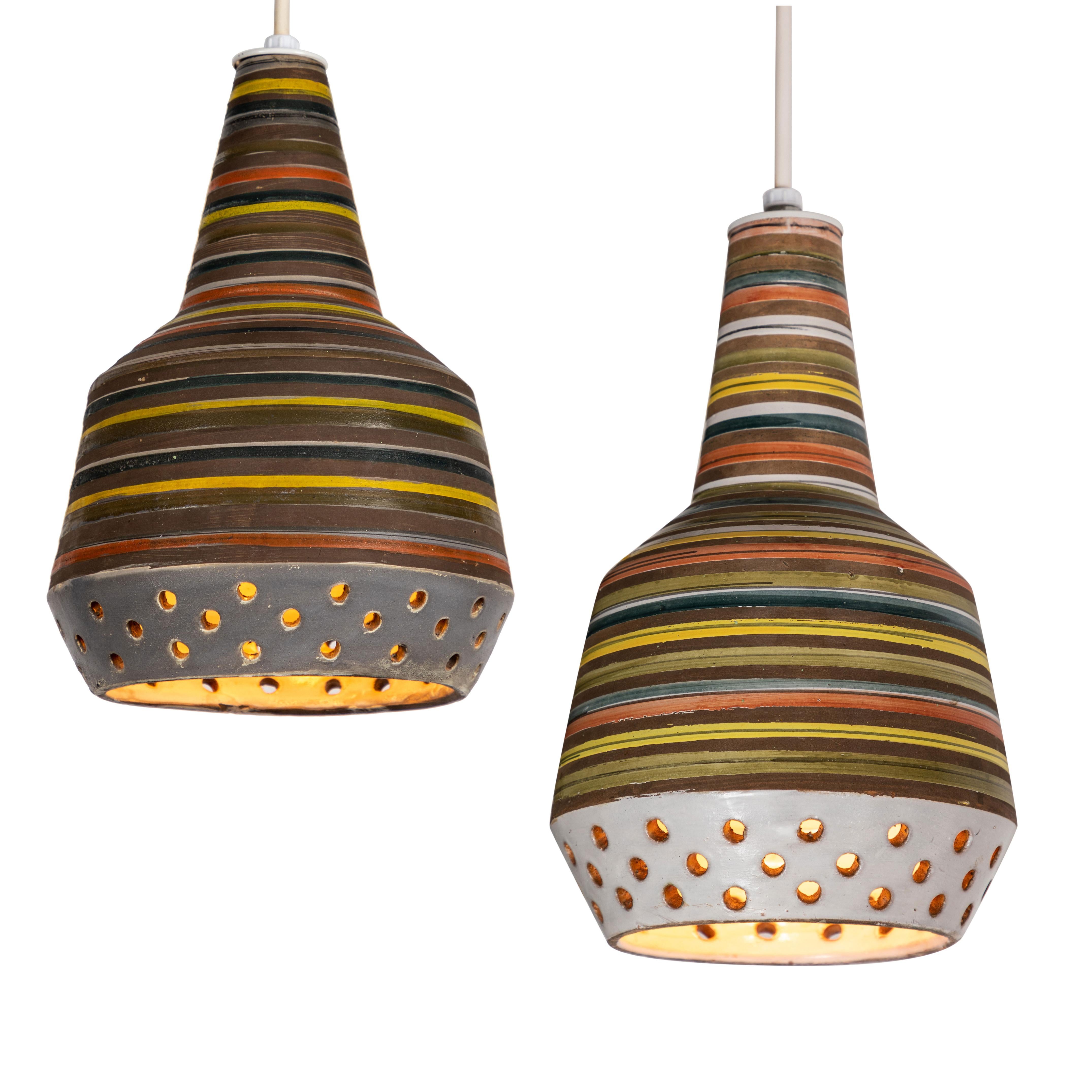 1950s Aldo Londi ceramic Bitossi pendant lamp for Italian Raymor. This rare and sculptural Italian ceramic lamp is executed with multi colored glazed horizontal stripes and geometric circular perforations. 

Only one available in this coloration.