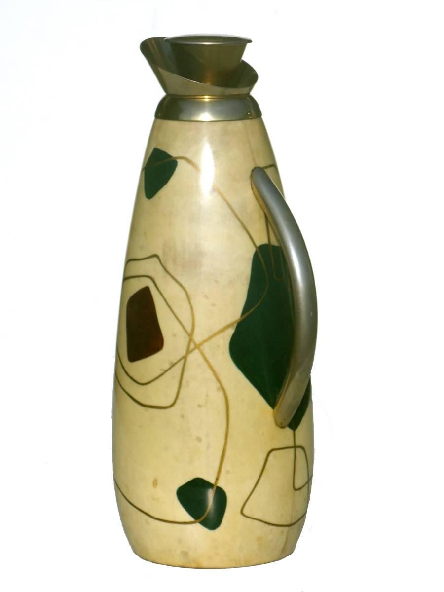 Carafe
by Macabo
Italy, 1950s.

Painted goatskin, metal details
