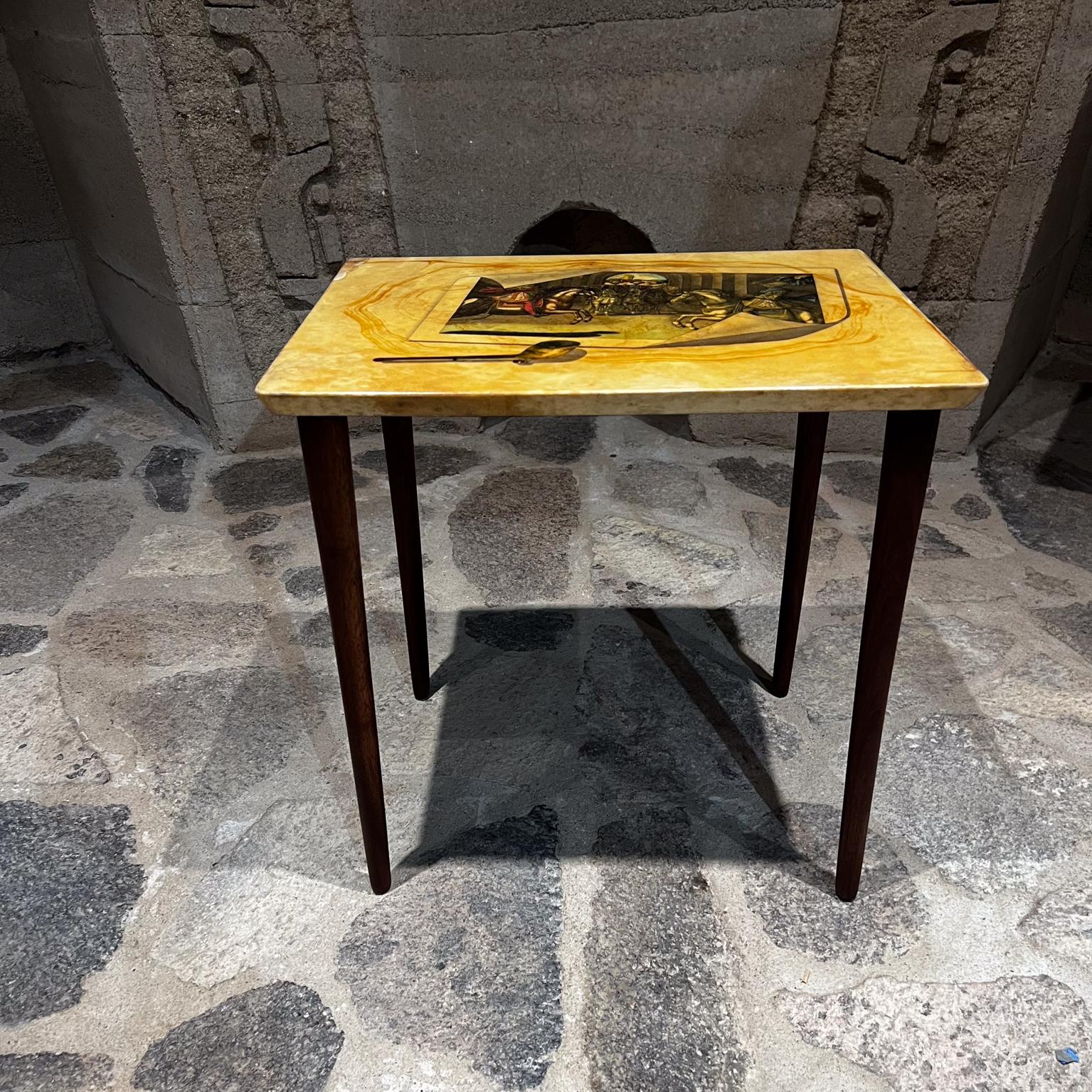 Aldo Tura Side Table mahogany wood and goatskin Italy 1950s
Tabletop has exquisite renaissance art after Piero Fornasetti.
Unmarked.
19 w x 14.5 d x 19 h
Legs can be removed.
Original unrestored vintage condition. Wear consistent with age and use.