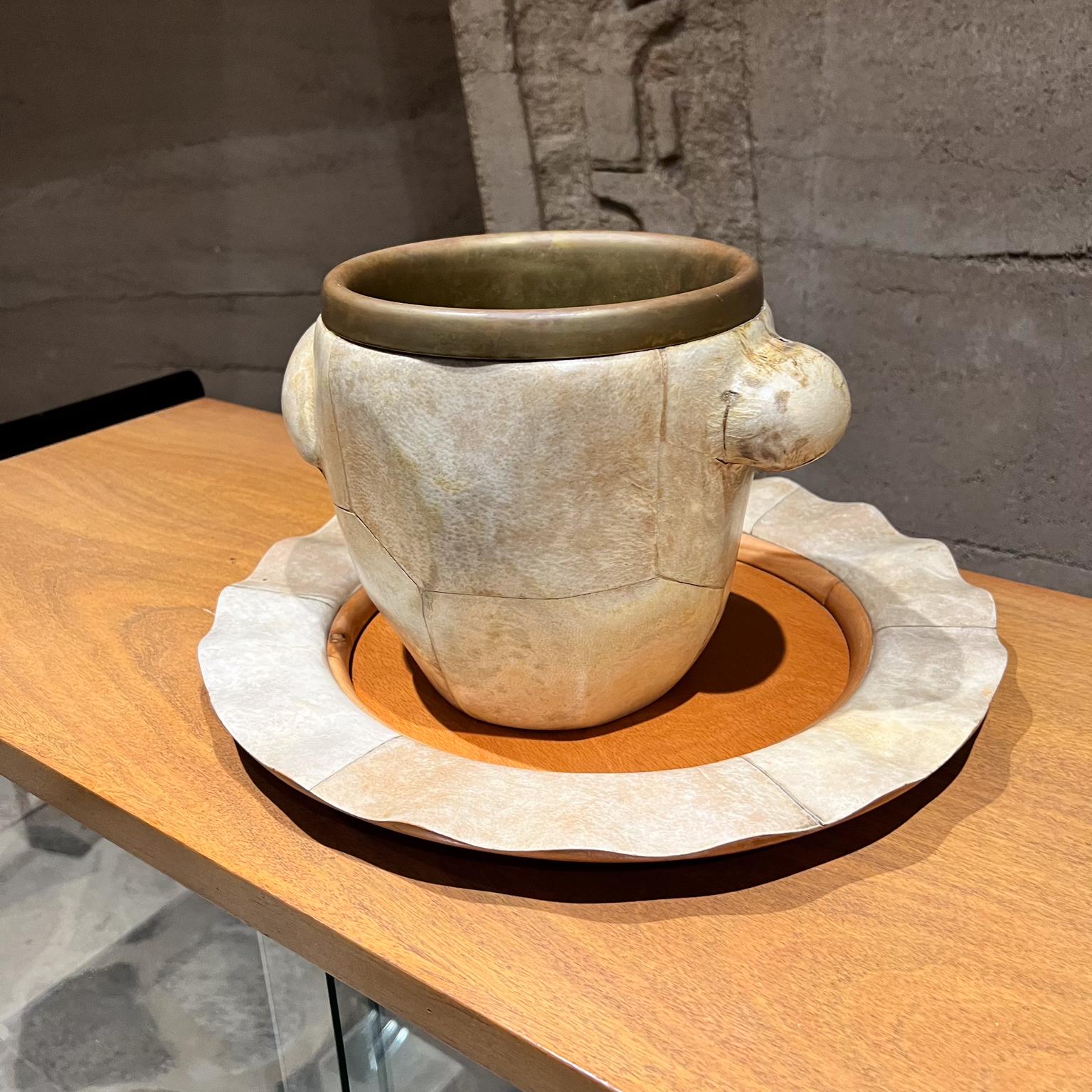 1950s Aldo Tura Goatskin Serving Set Ice Bucket & Tray Macabo Cusano
Milano Italy
Elegant goatskin, wood & brass.
Ice Bucket Champagne Holder handmade wood Serving Tray.
Original vintage preowned condition.
Wear is present. Refinished.
Not 100%