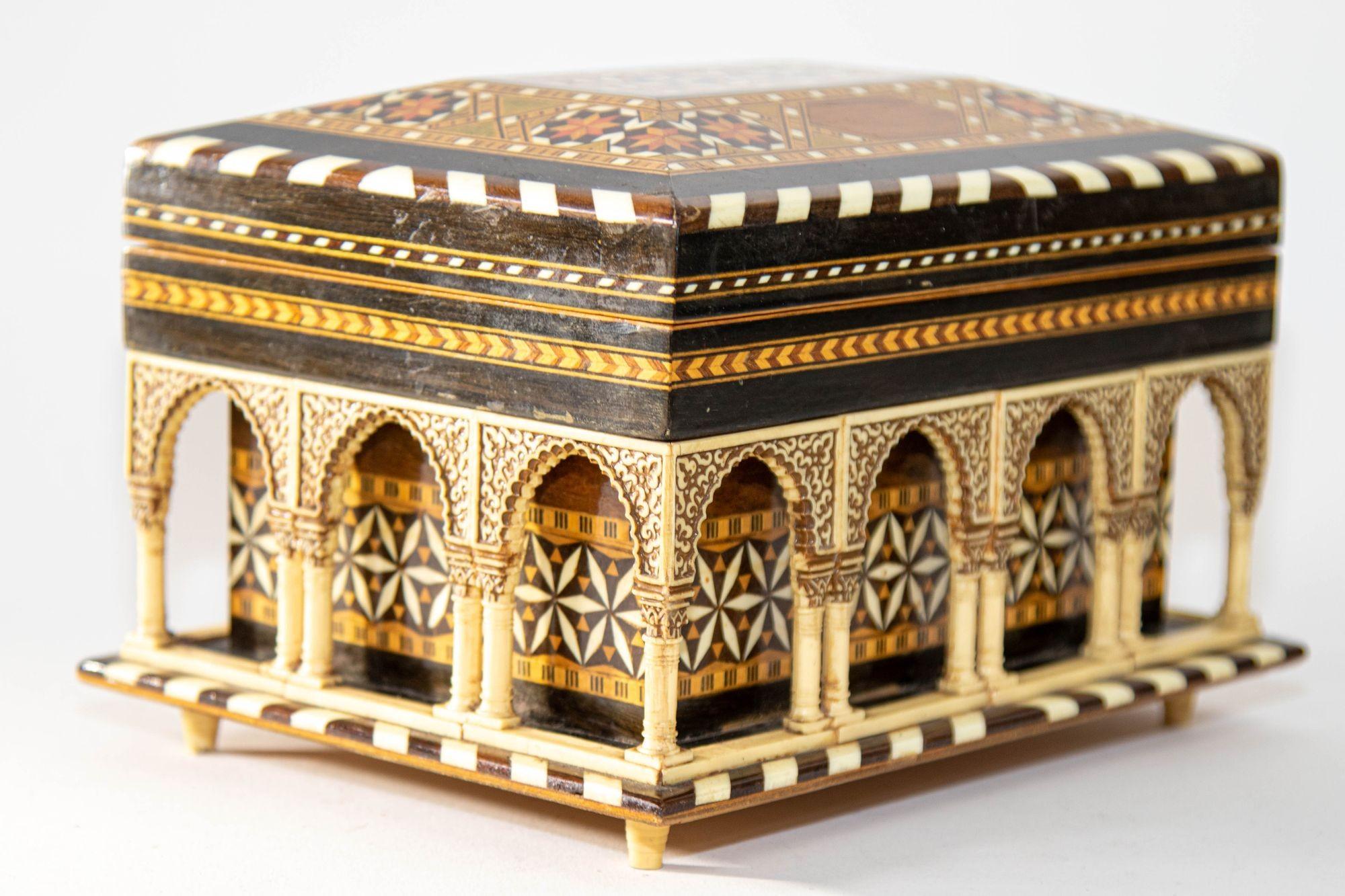 1950s Alhambra Palace Granada Spain Handmade Footed Moorish Vanity Box.
Vintage Beautiful wood marquetry jewelry trinket Box, Architectural Model of the Granada's Alhambra Palace Moorish Islamic Art.
DIMENSIONS: Height: 5.25 in (14 cm)Width: 6.25 in