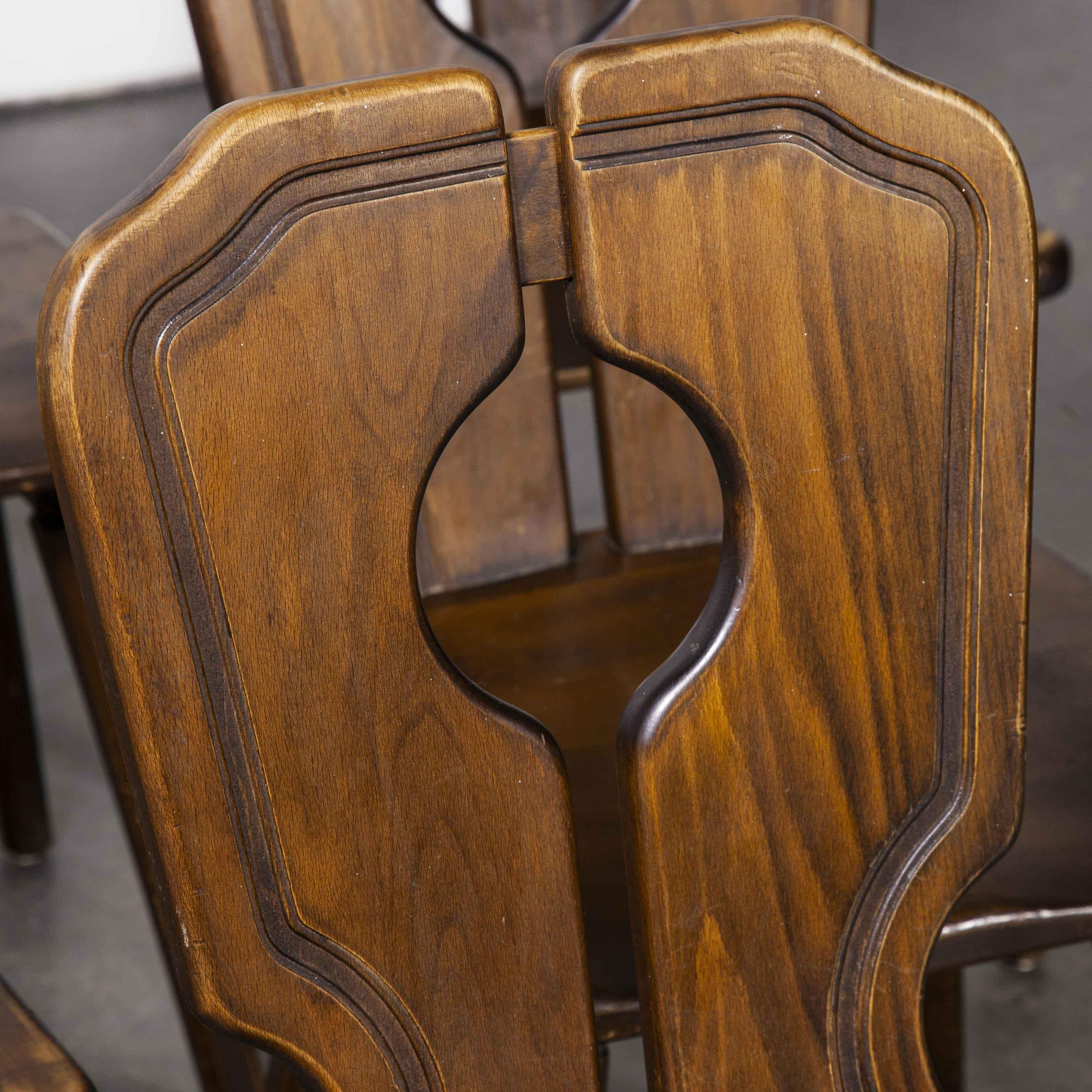 1950’s Alsace regional open back dining chair – set of six. This alpine influenced design is well known in the Alsace region. Handmade in solid beech they have a distinct and appealing mid century design. These chairs were made locally in small