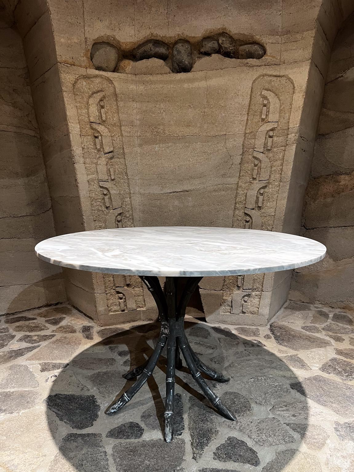 
1950s Mexico Faux Bamboo Pedestal Dining Table
Designed in chrome steel aluminum and marble.
Unmarked. Style of Arturo Pani.
Top 48 x .75 marble Base 29.25 tall x 26.25 diameter
Original fair vintage condition. New marble top.
Raw aluminum with