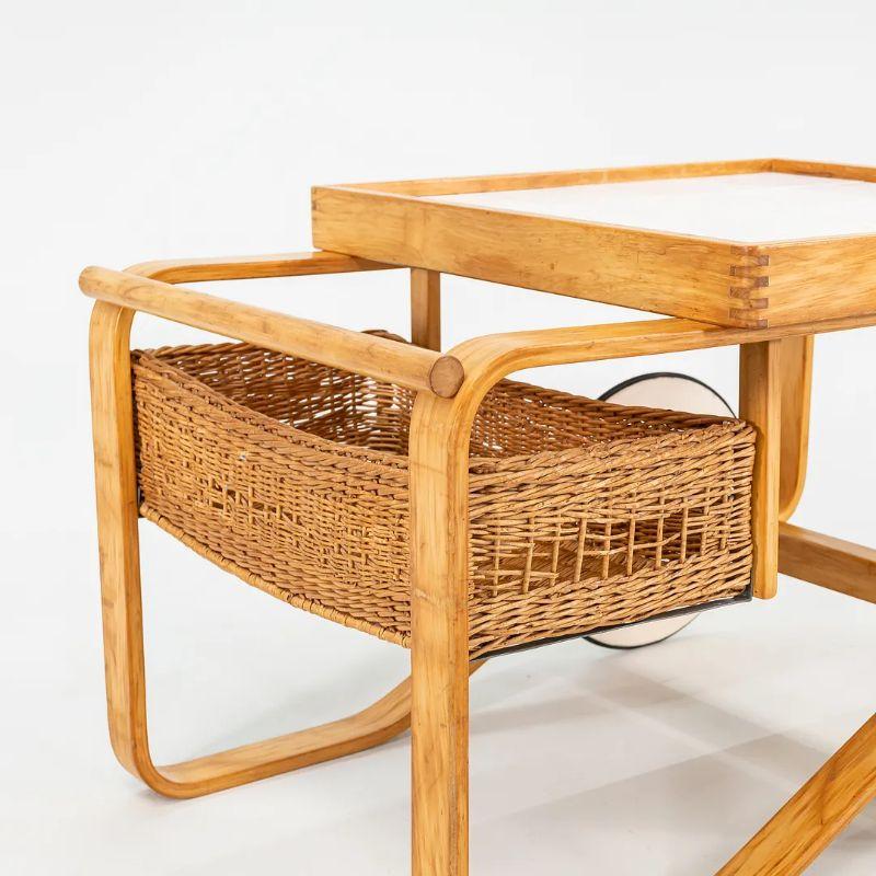 This is an original ‘Tea Trolley 900’ Modern Cart, designed in 1937 by Aino and Alvar Aalto for the World Exhibition in Paris. The Aalto’s use of Finnish birch and rattan could be considered an early form of “organic modernism”; it was their take on