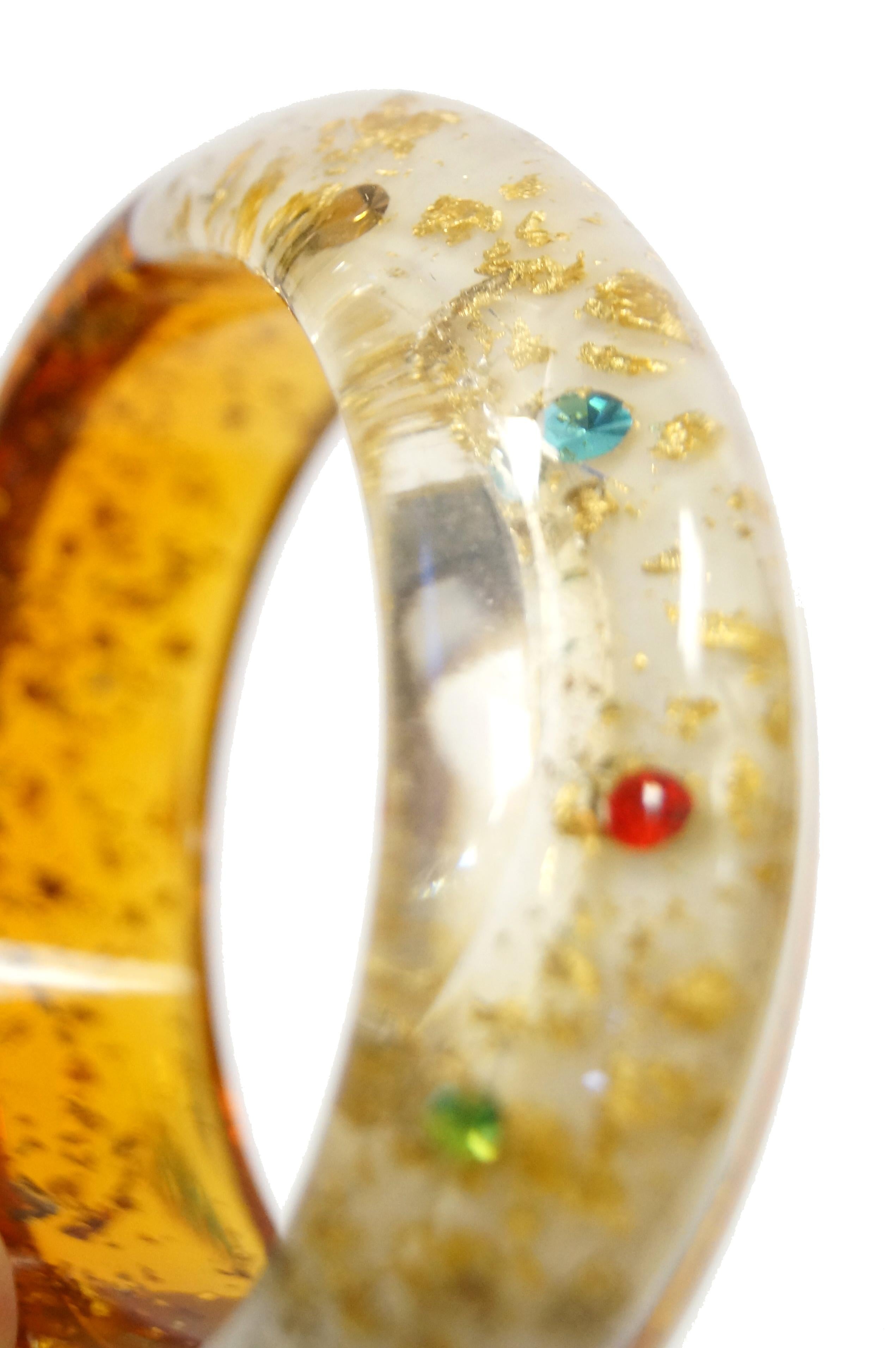 Modern 1950s Amber Lucite Bangle with Glitter and Rhinestone Inclusions For Sale