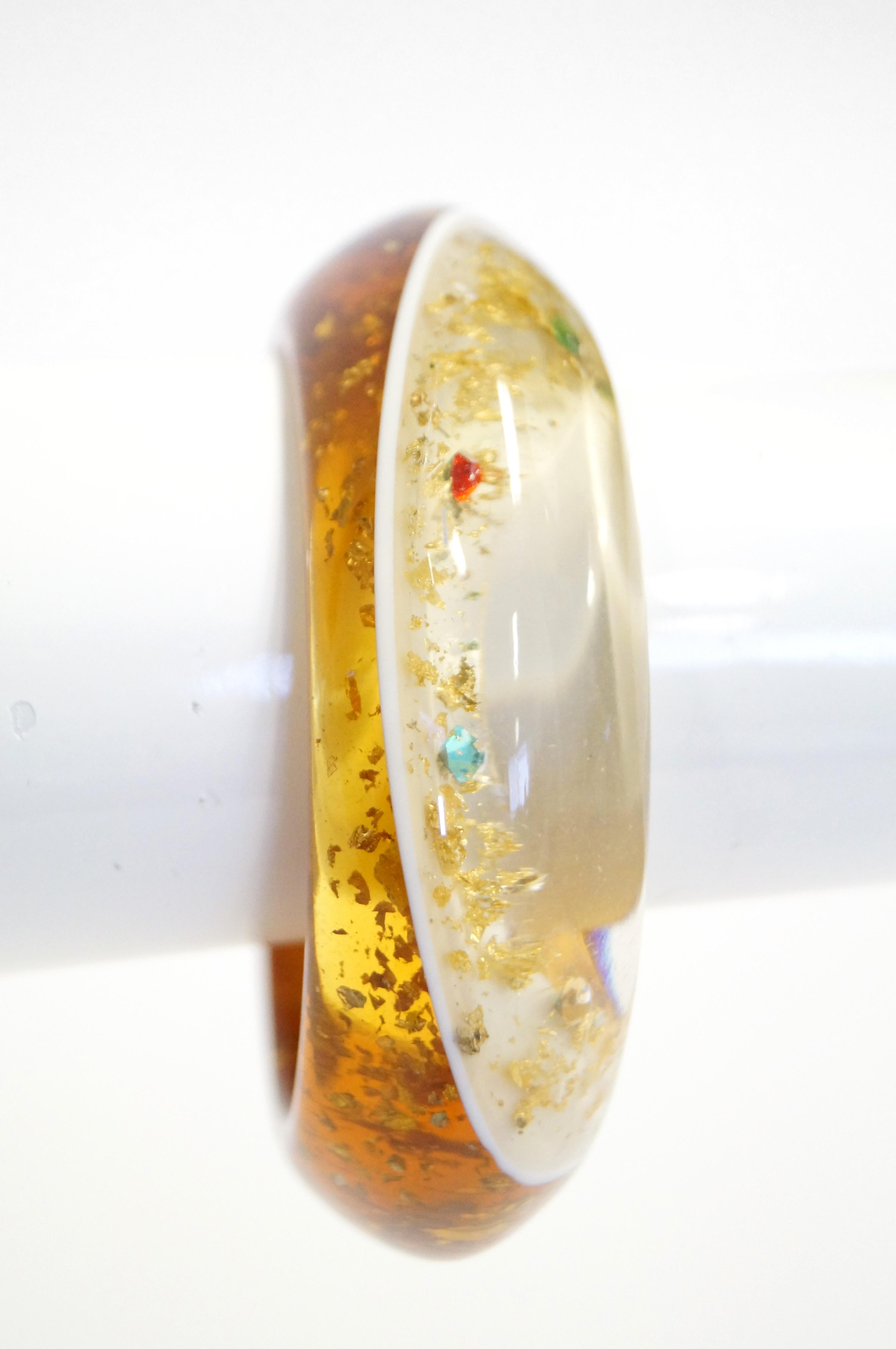1950s Amber Lucite Bangle with Glitter and Rhinestone Inclusions For Sale 1