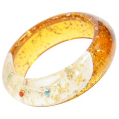 Vintage 1950s Amber Lucite Bangle with Glitter and Rhinestone Inclusions 