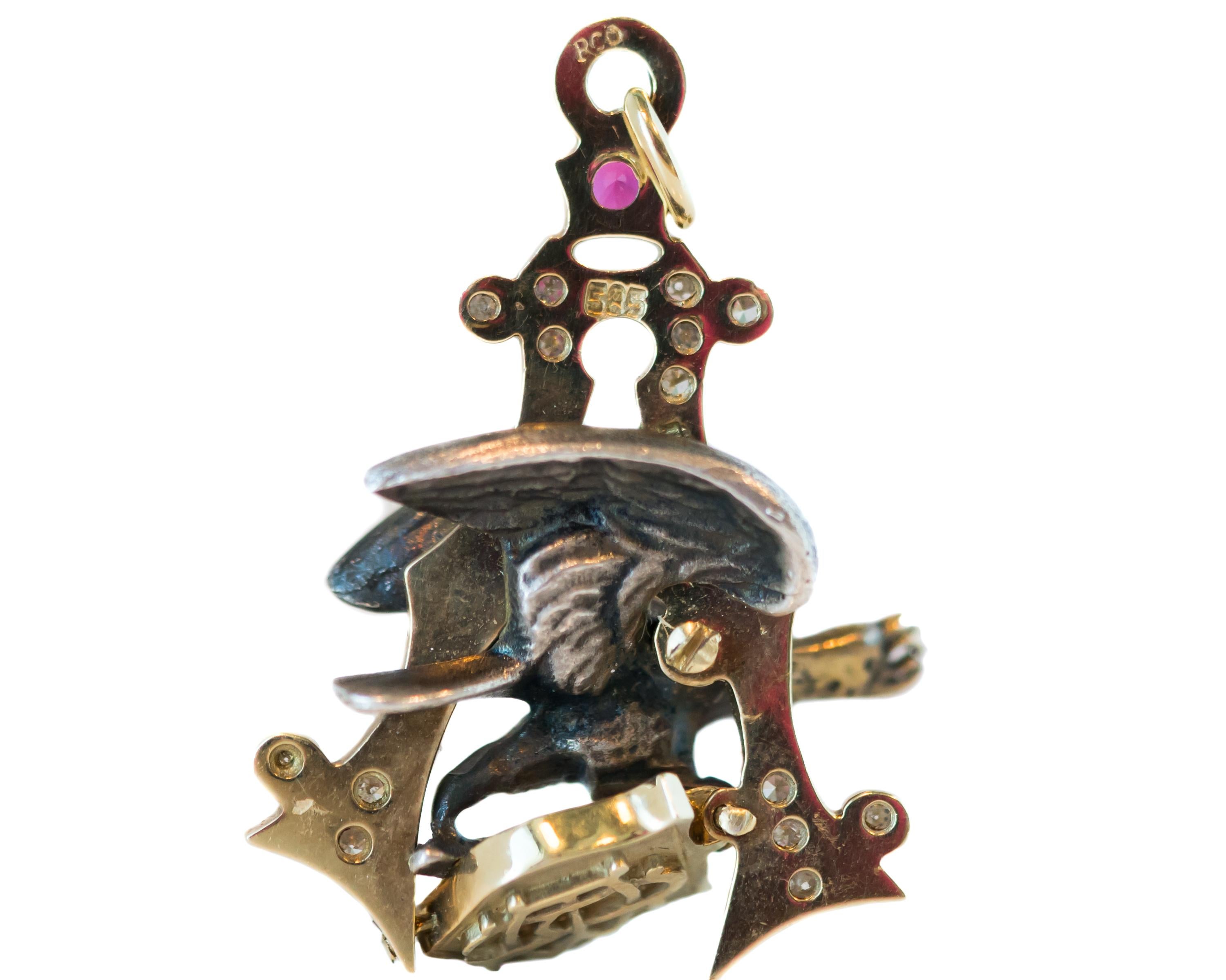 1950s Retro Eagle, American Flag Pendant - 14 Karat Yellow Gold, Sterling Silver, Diamonds, Red Gemstones

Features:
14 Karat Yellow Gold Letter A Background
Sterling Silver Screaming Eagle with Outstretched Wings, Open Beak, Fanned Tail and