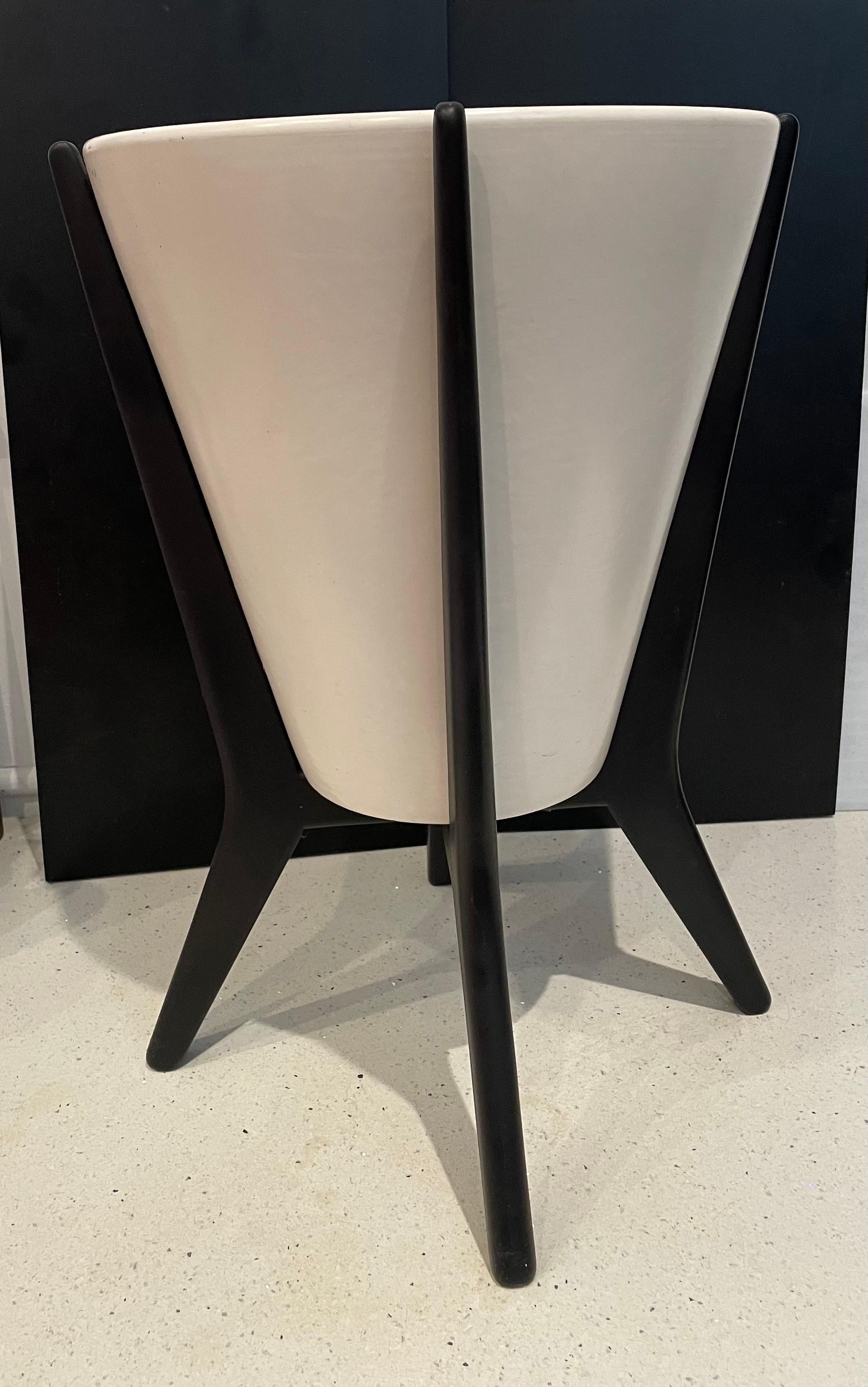 This unique American Mid-Century Modern, atomic age Architectural planter with black Laquer Adrian Pearsall style base, excellent condition no chips or cracks one of a kind piece.