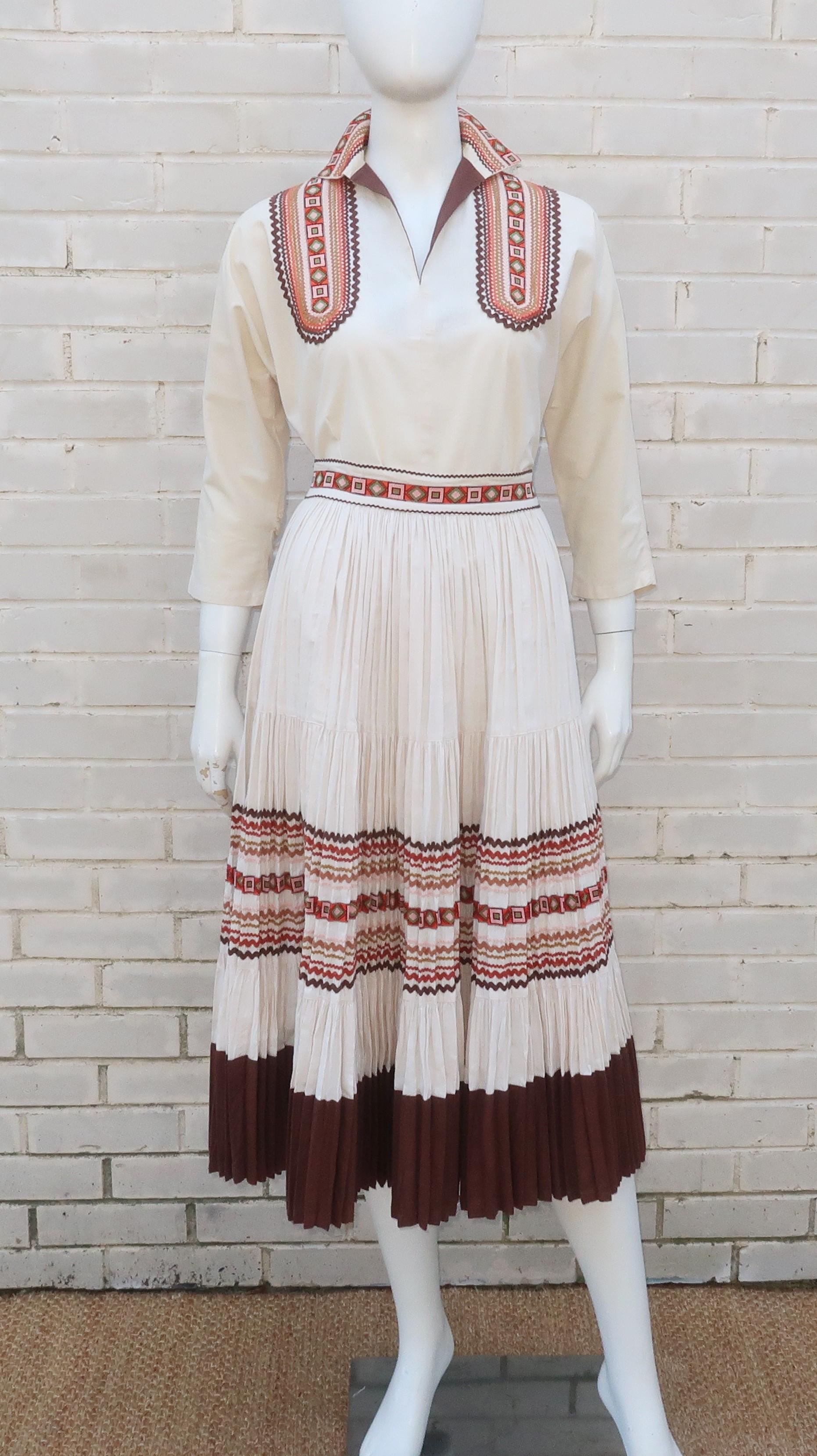 Patio dresses came into fashion from the 1940's through the 1950's and incorporated Native American motifs with the casual style of a day dress for a distinct Western wear vibe.  The prominent designers for this look hailed from Arizona and often