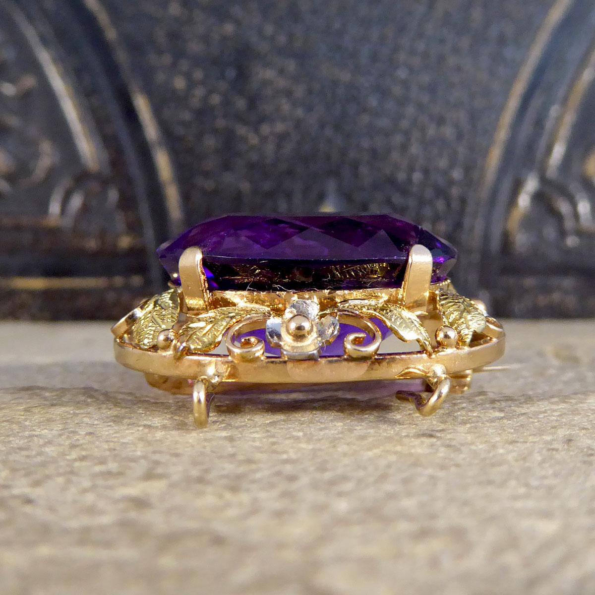 Such a gorgeous vintage brooch and pendant that has been crafted in the 1950's in great condition. It features a beautiful big and vibrant Amethyst gemstone in the centre with a claw setting. The brooch itself has a filigree pattern around the
