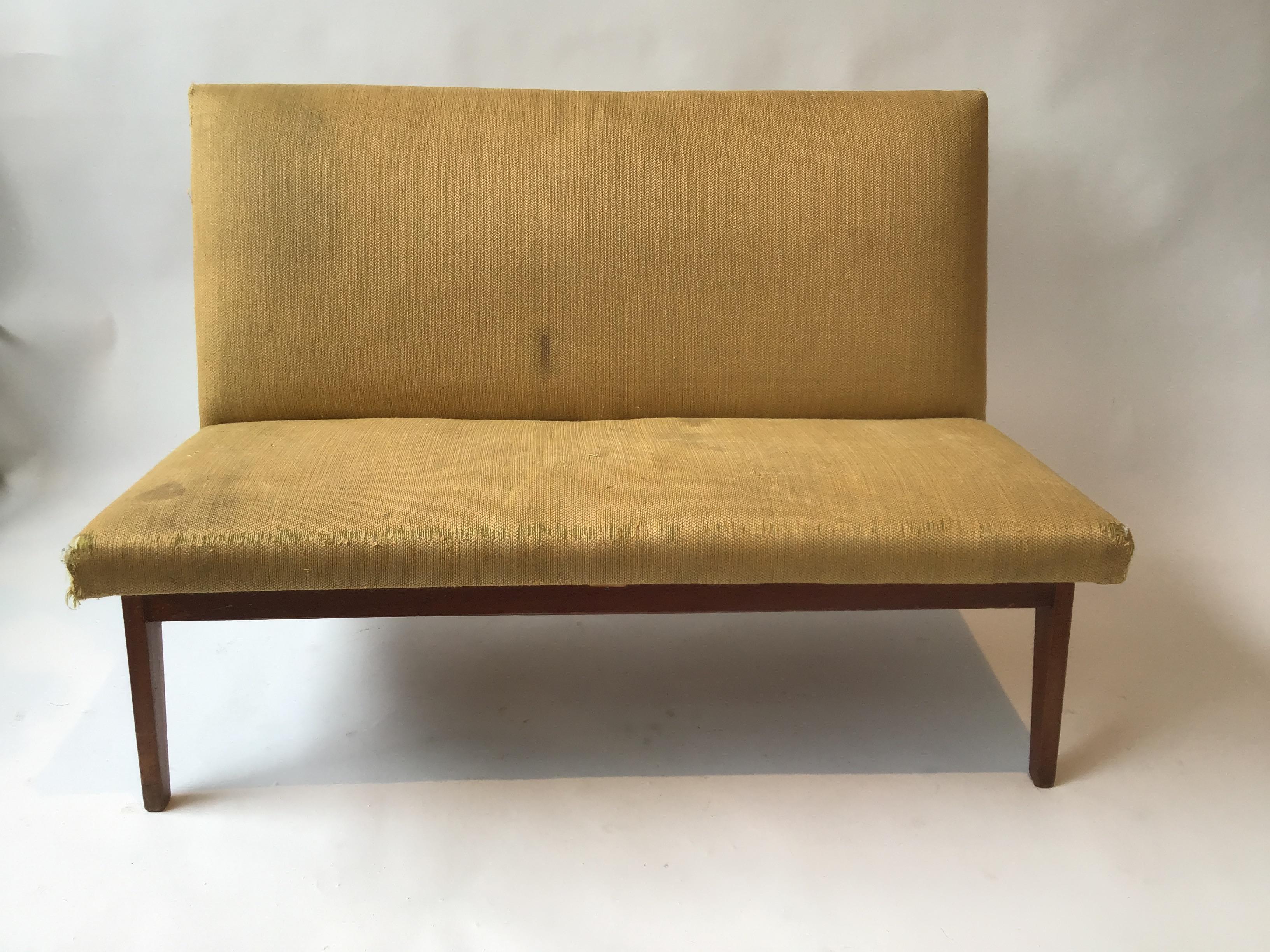 1950s angular settee. Needs reupholstering and refinishing.