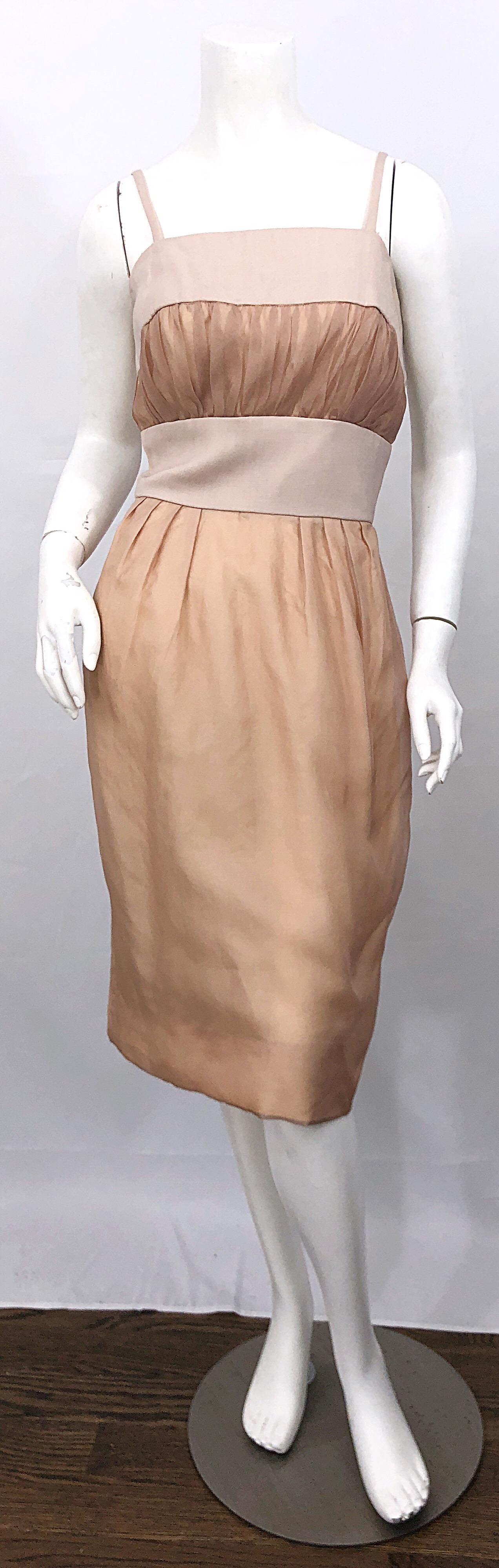 Beautiful 1950s ANITA MODES demi couture nude blush silk bombshell dress! Features a nude silk base with sheer chiffon overlay. Linen waistband, each shoulder strap, and above the bodice. Puckered chiffon at bust is so intricate, and very