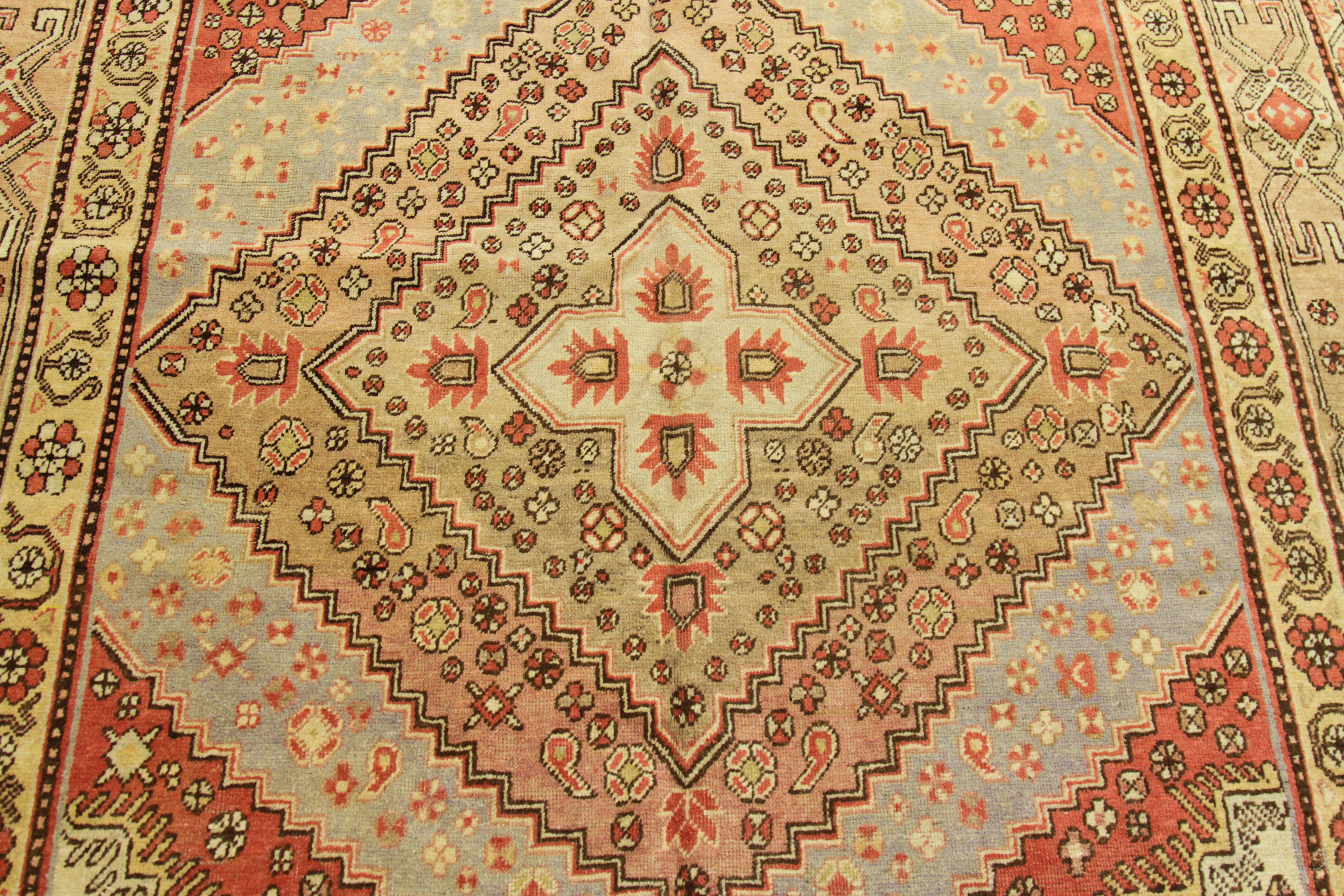 1950s Antique Central Asian Rug Khotan Style with Elaborate Floral Motif For Sale 1