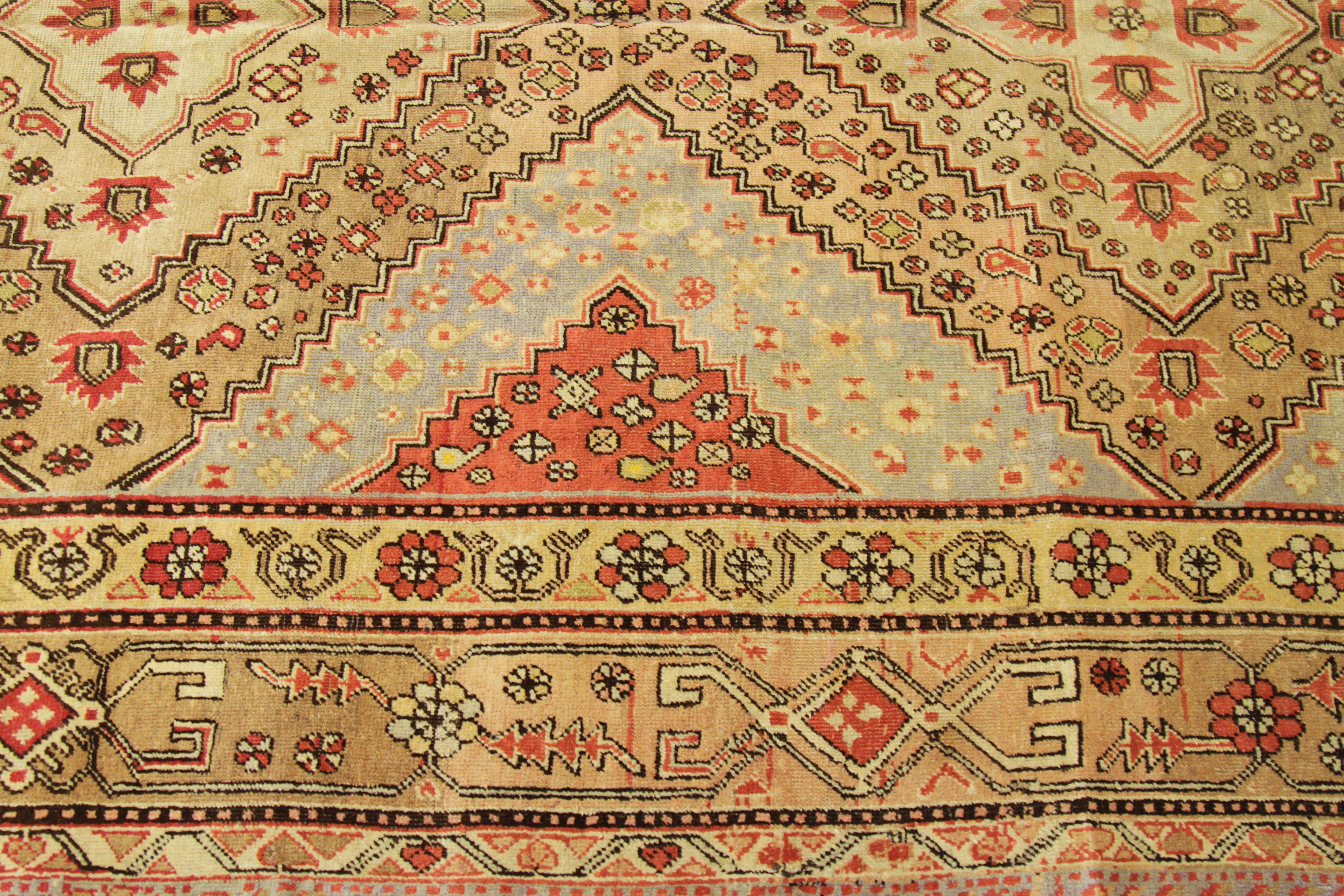 1950s Antique Central Asian Rug Khotan Style with Elaborate Floral Motif In Excellent Condition For Sale In Dallas, TX