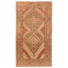 1950s Antique Central Asian Rug Khotan Style with Elaborate Floral Motif