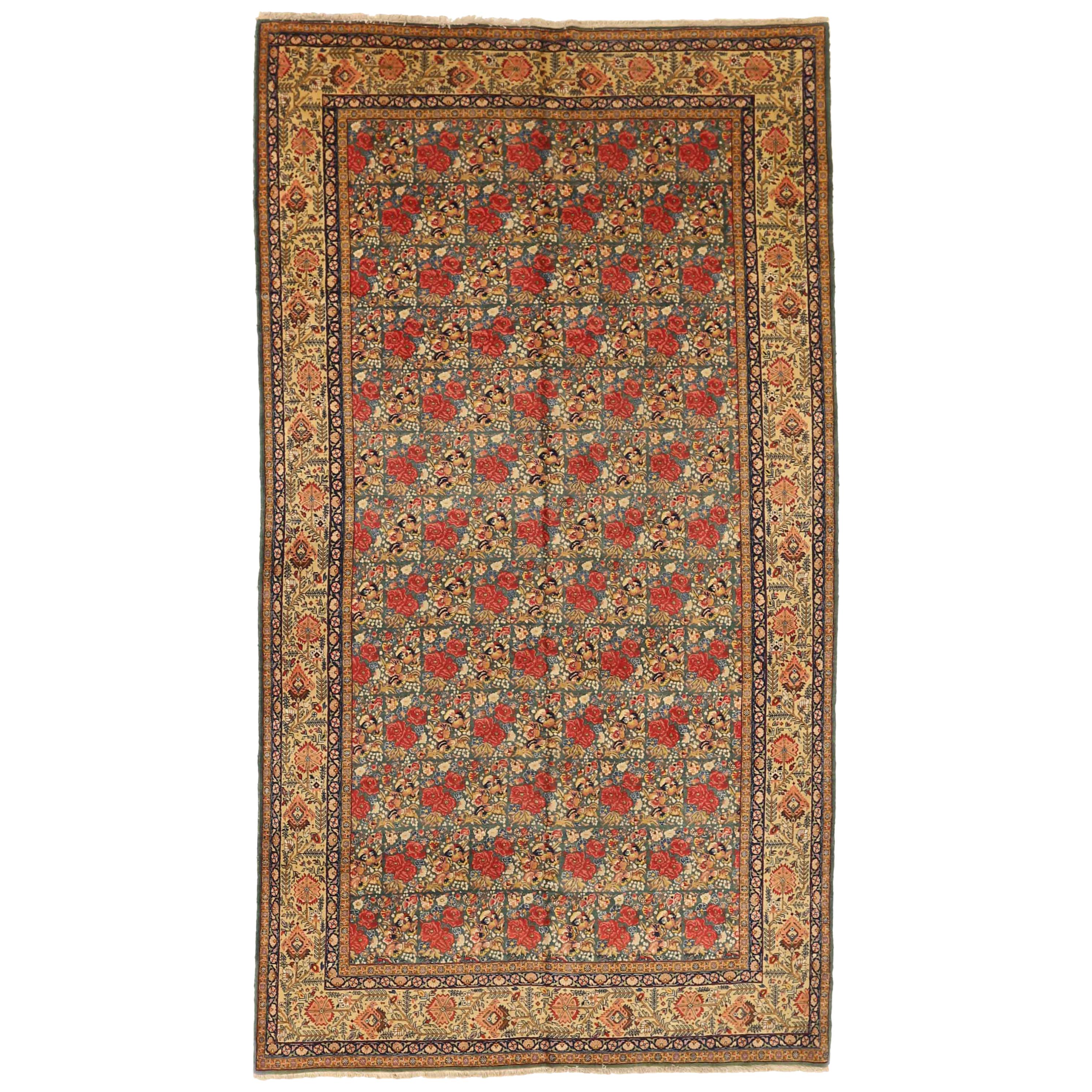 1950s Antique Persian Rug Tabriz Design with Gold and Red Field of Roses Pattern For Sale