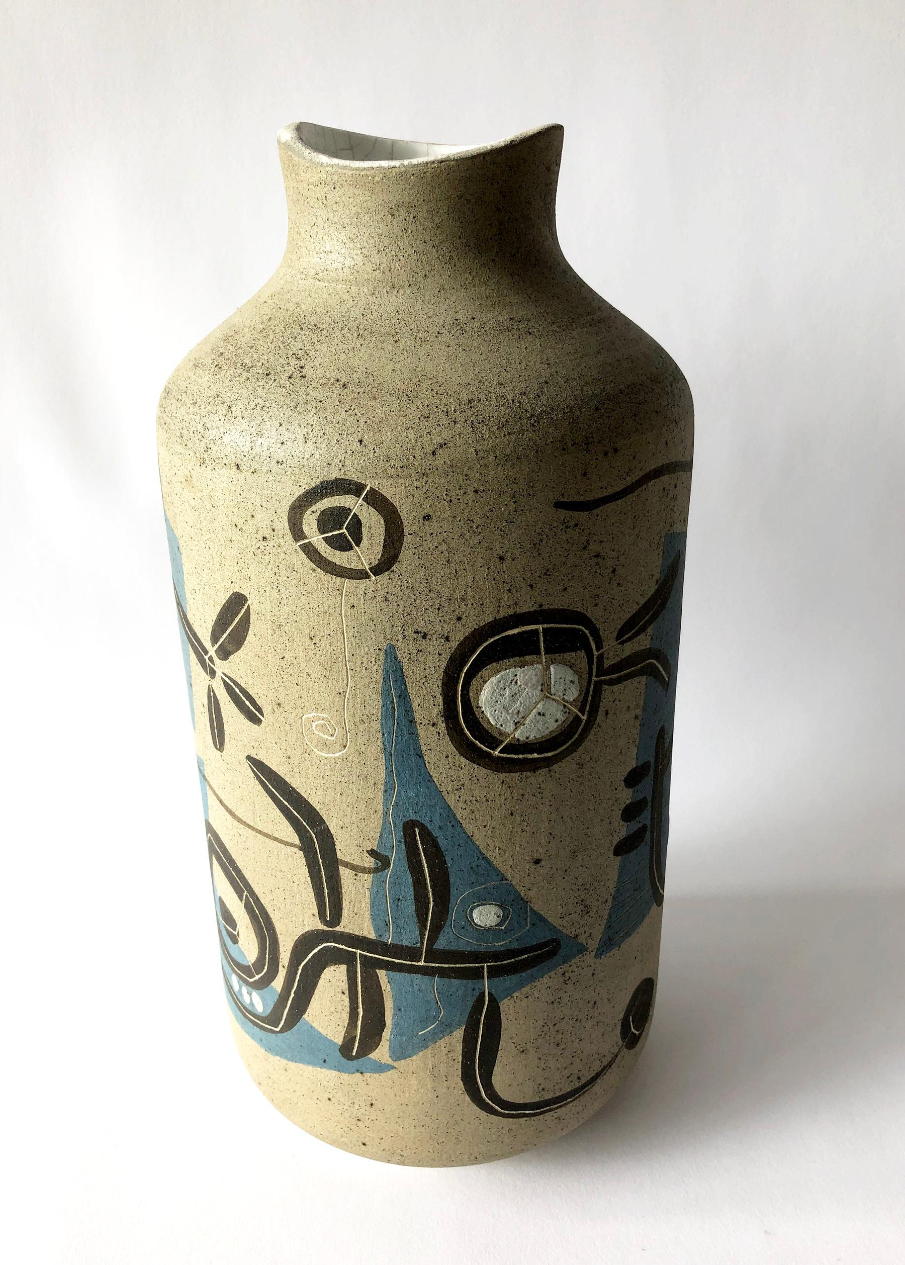 Surrealist ceramic vase made by artist Arganat, possibly Spanish in origin. Vase has a hand painted and incised dream-like design created by the artist, much like the work of Miro and Cocteau. Piece measures 13