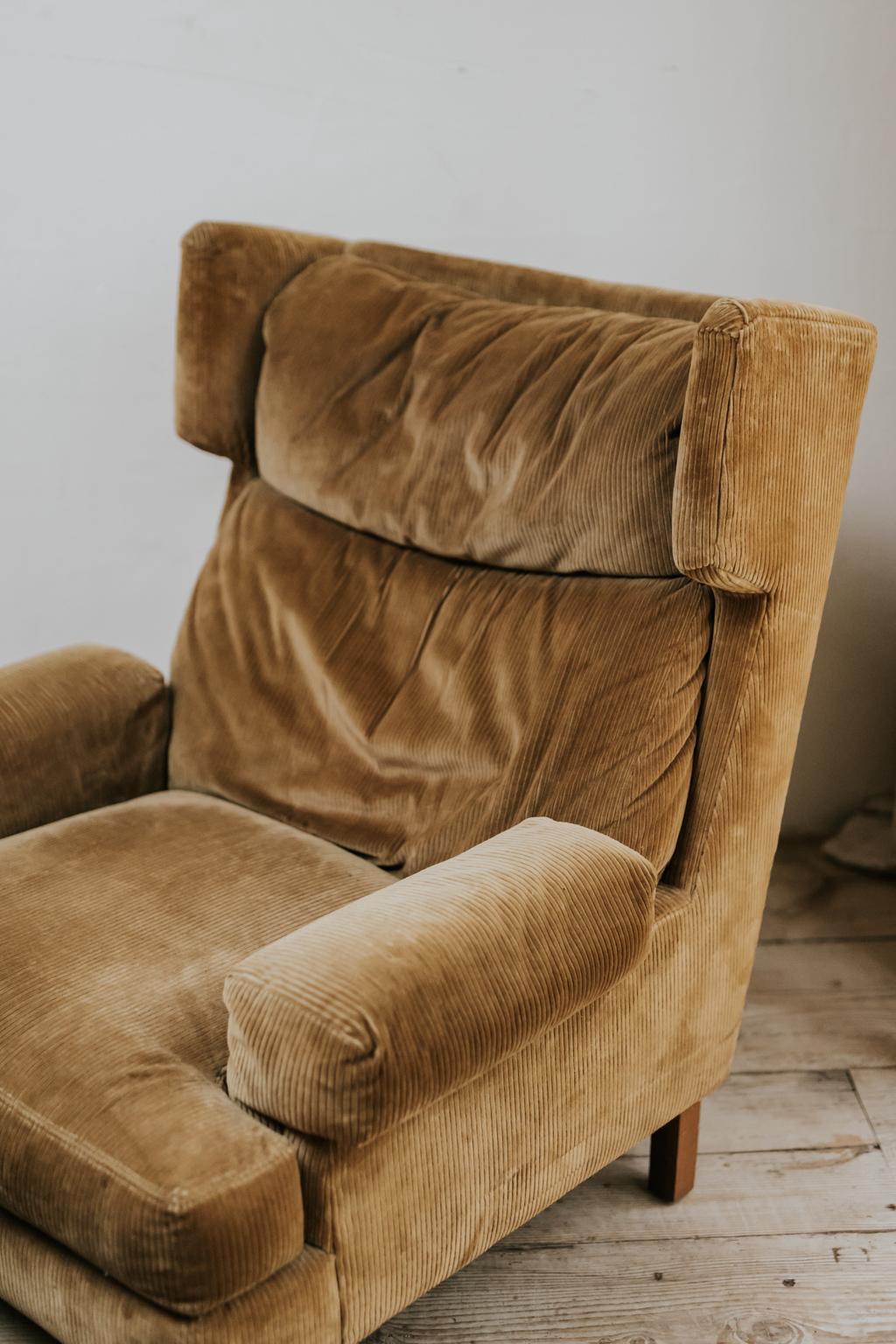 The most comfortable armchair and ottoman you can imagine, made in the 1950s, covered with its original curduroy fabric,
Big risk if you get in you possible can't get out of it.
Dimensions: Armchair 100 cm high, seat 42 cm x 100 cm deep and 92 cm
