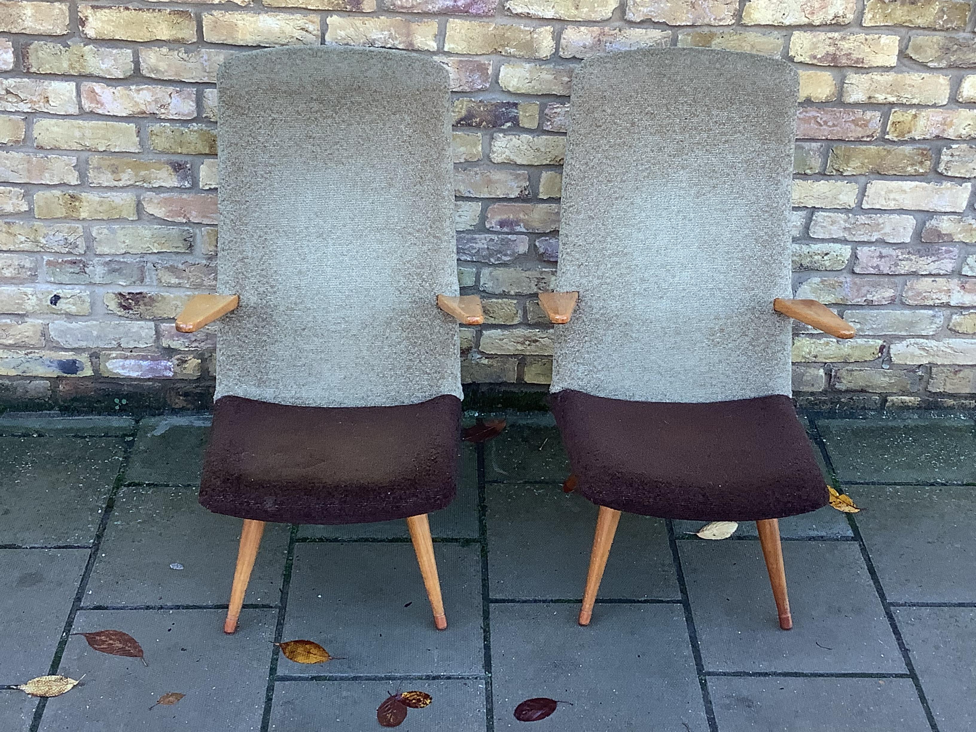 Simple stylish pair of armchairs in a two tone fabric with tapered wooden legs.
design in the style of early Cees Braakman work Cc1950’s
Unattributed.