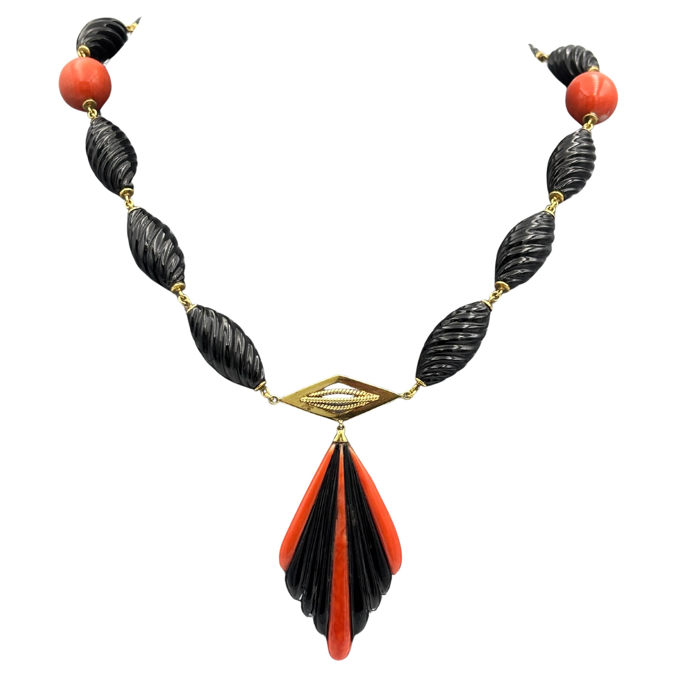 1950s Art Deco 18k gold onyx and coral sautoire