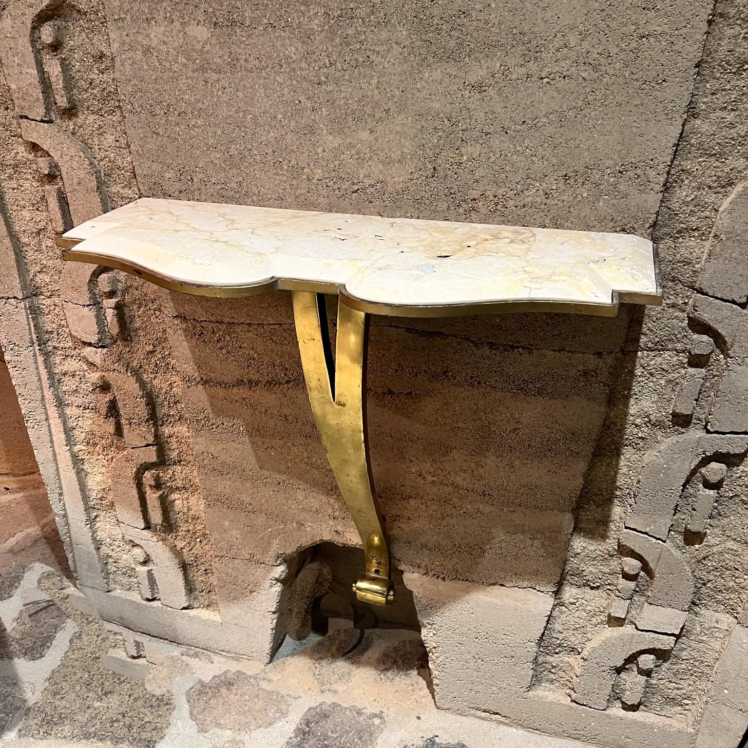 1950s Arturo Pani Console Table Mexico City
Sculptural Bronze Gilt Iron Travertine with beveled edge
28 h x 30 w 12.25 d
Original preowned vintage condition. 
Travertine tabletop new.
Review images provided.
Delivery to LA OC SF Palm Springs