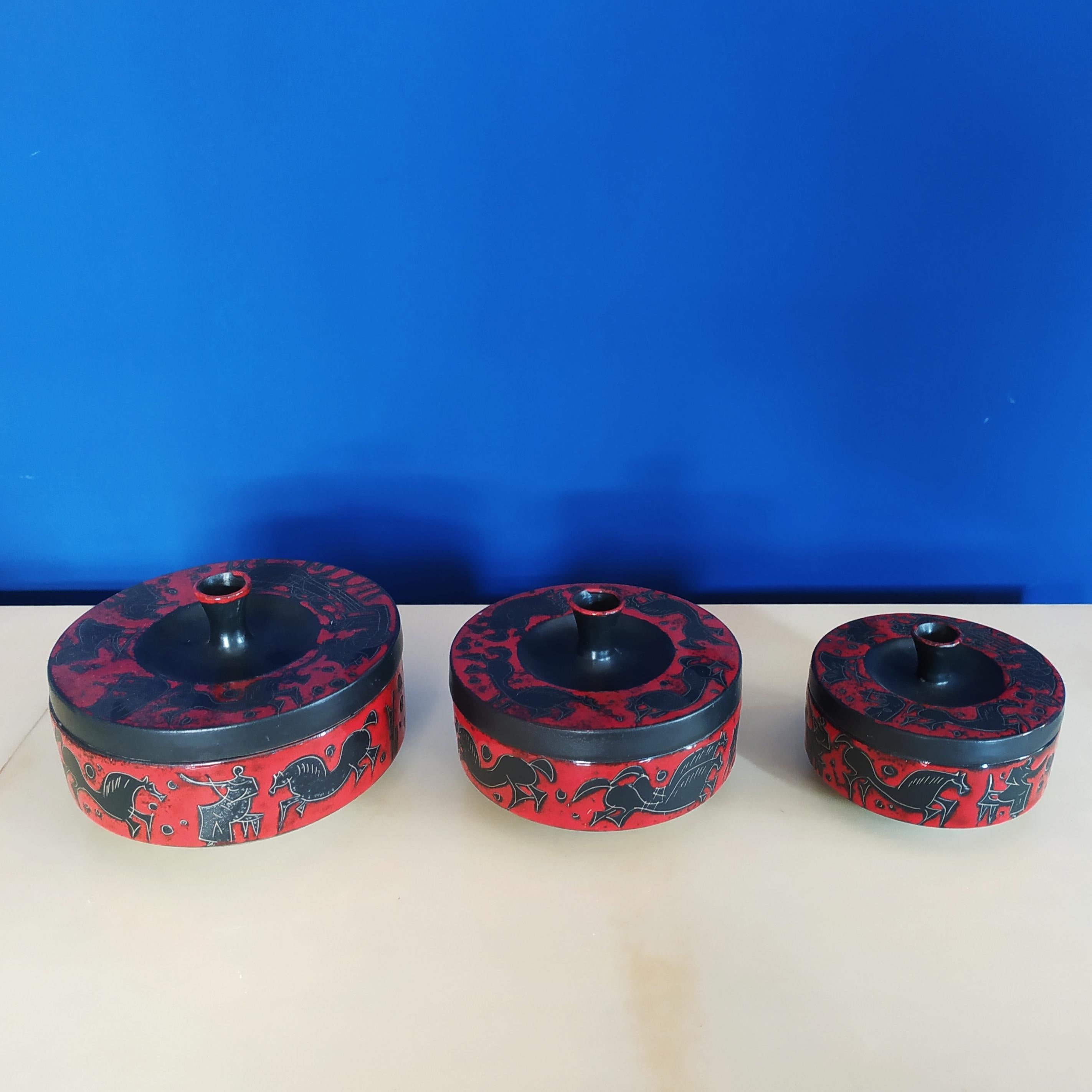 1950s Astonishing Set of 3 boxes red and black in ceramic.
