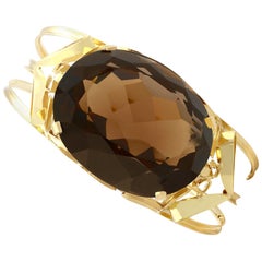 1950s Austrian 124.45 Carat Smokey Quartz and Yellow Gold Bangle