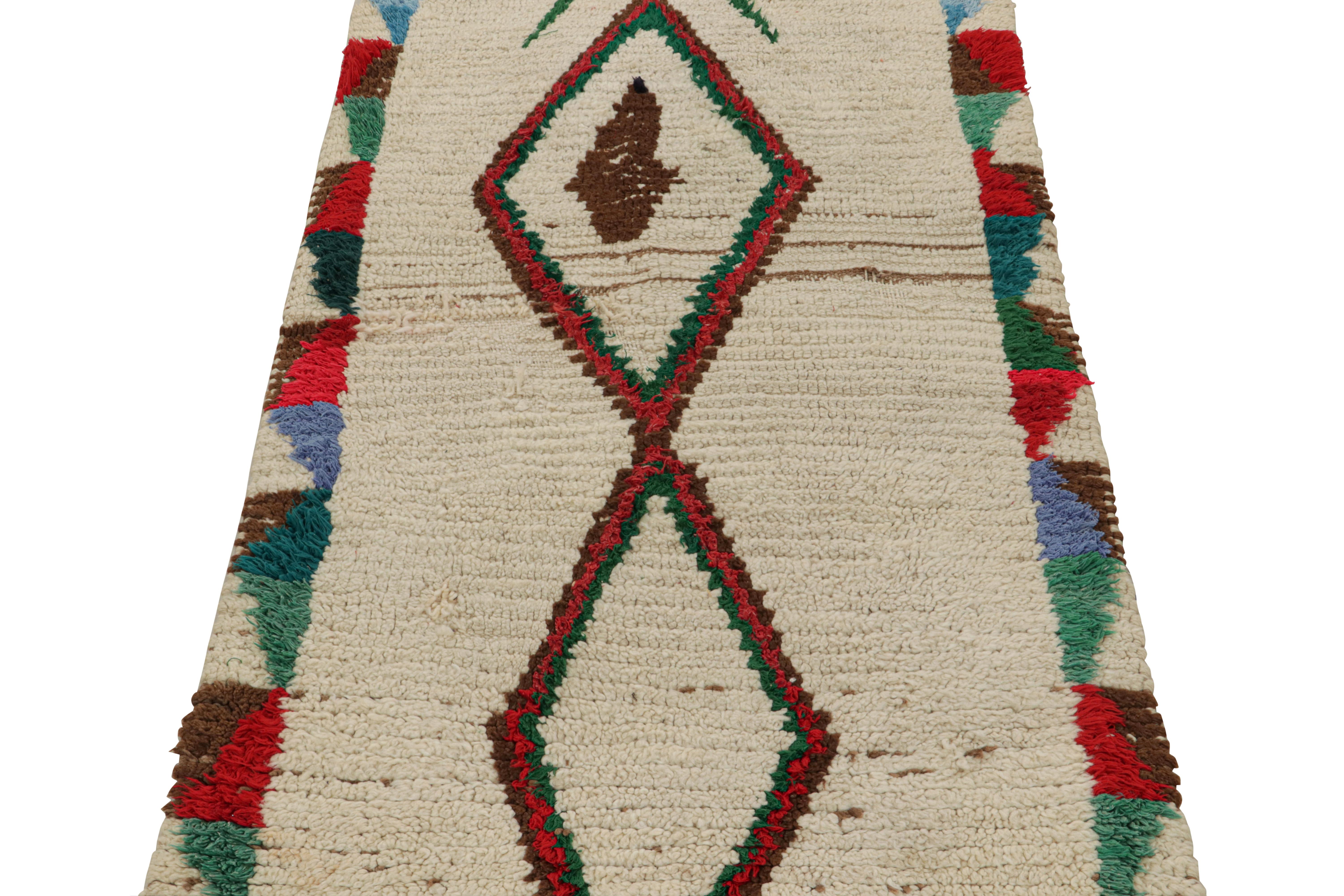 Tribal 1950s Azilal Moroccan rug in Beige with Red-Green Patterns by Rug & Kilim For Sale