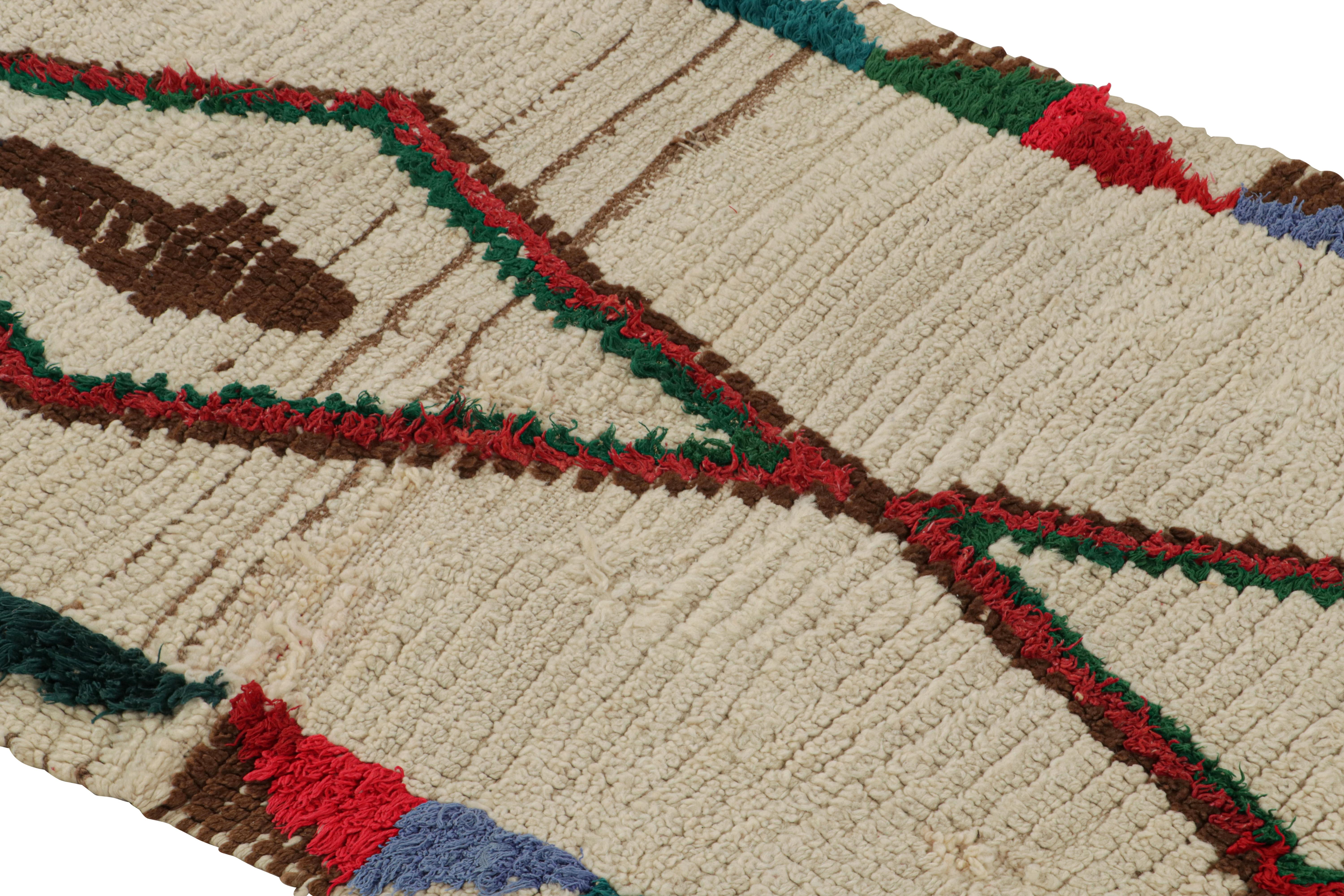 Hand-Knotted 1950s Azilal Moroccan rug in Beige with Red-Green Patterns by Rug & Kilim For Sale