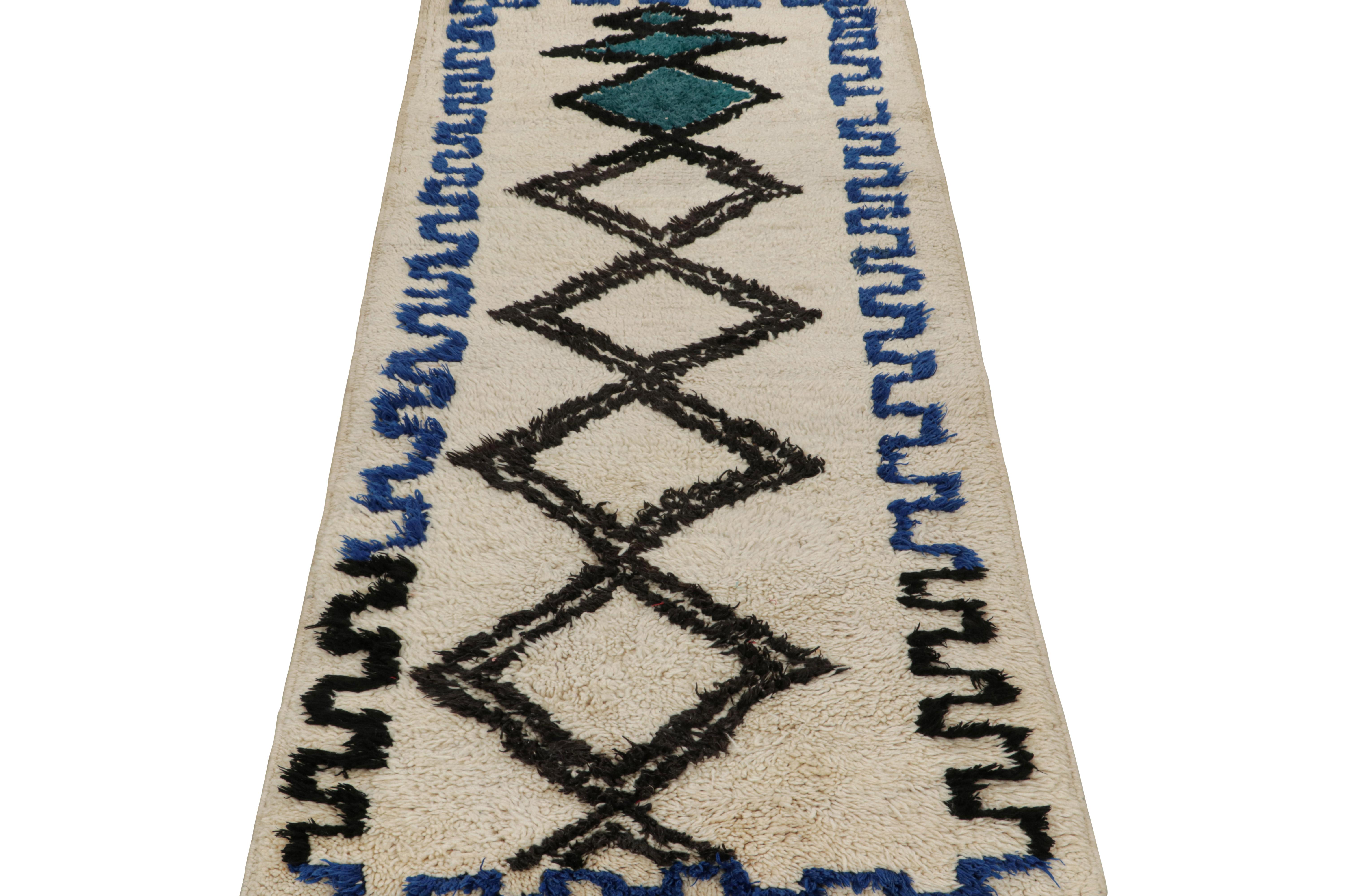 Tribal 1950s Azilal Moroccan rug in White with Blue-Black Patterns by Rug & Kilim For Sale