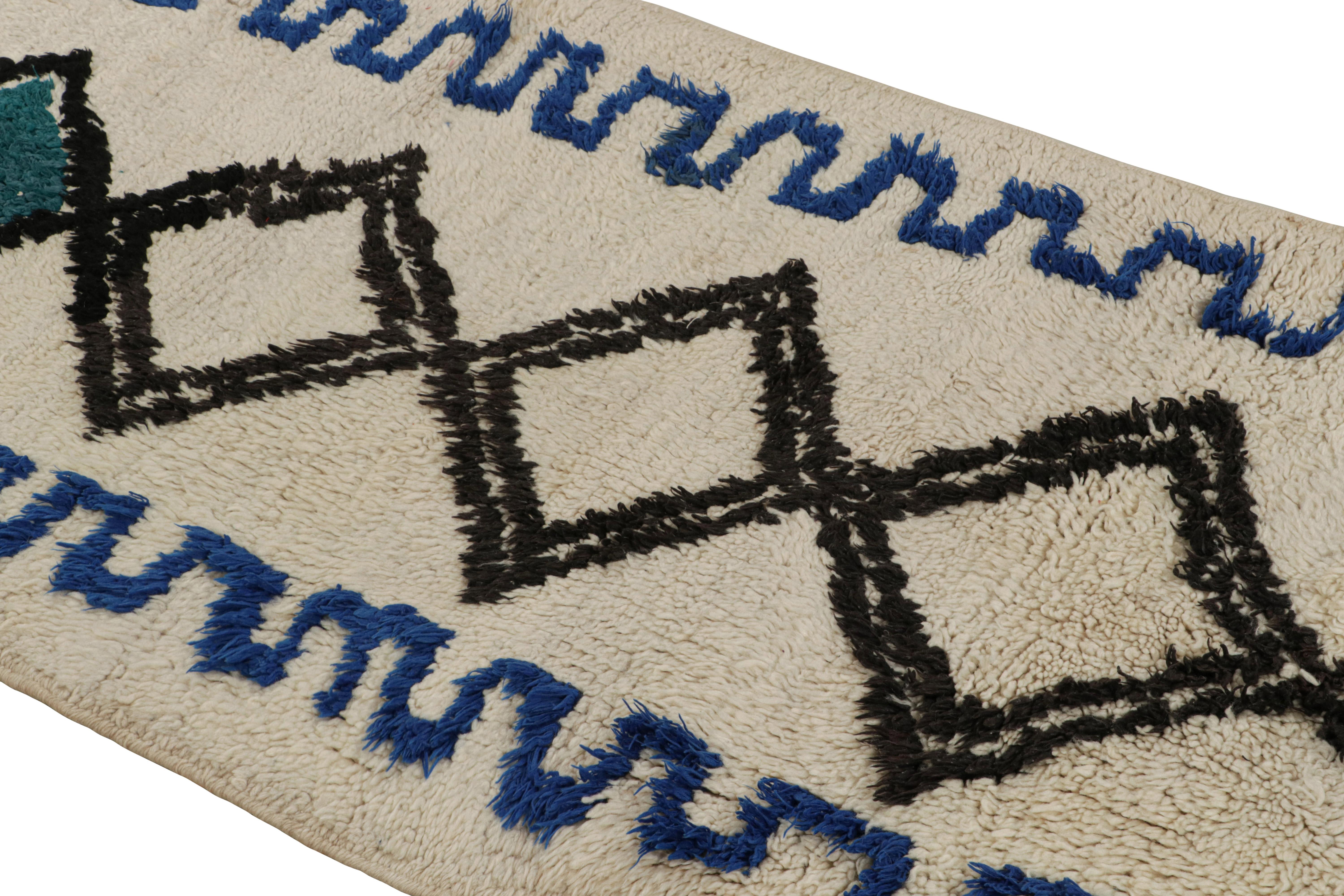 Hand-Knotted 1950s Azilal Moroccan rug in White with Blue-Black Patterns by Rug & Kilim For Sale