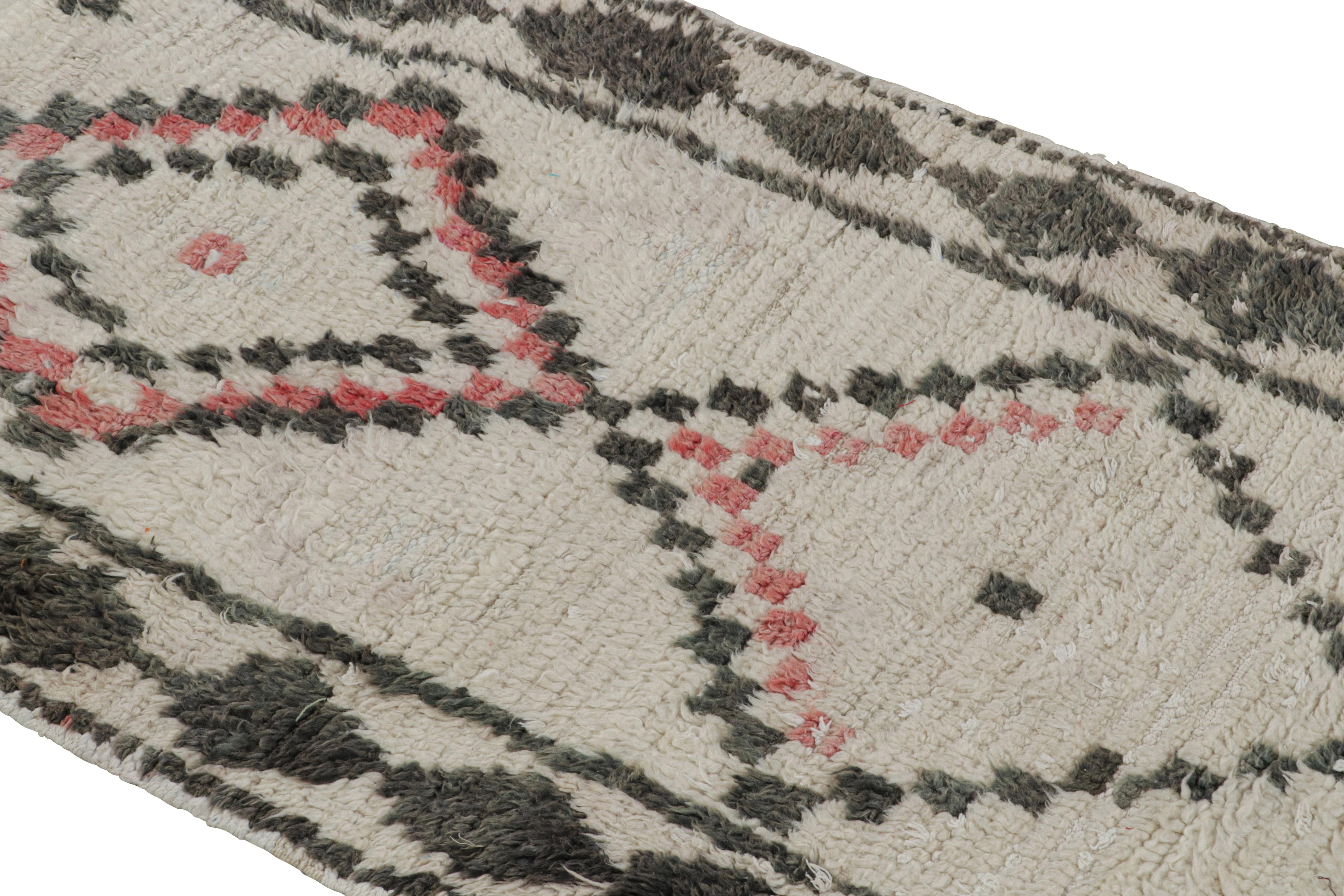 Hand-Knotted 1950s Azilal Moroccan rug in White with Red-Black Patterns by Rug & Kilim For Sale