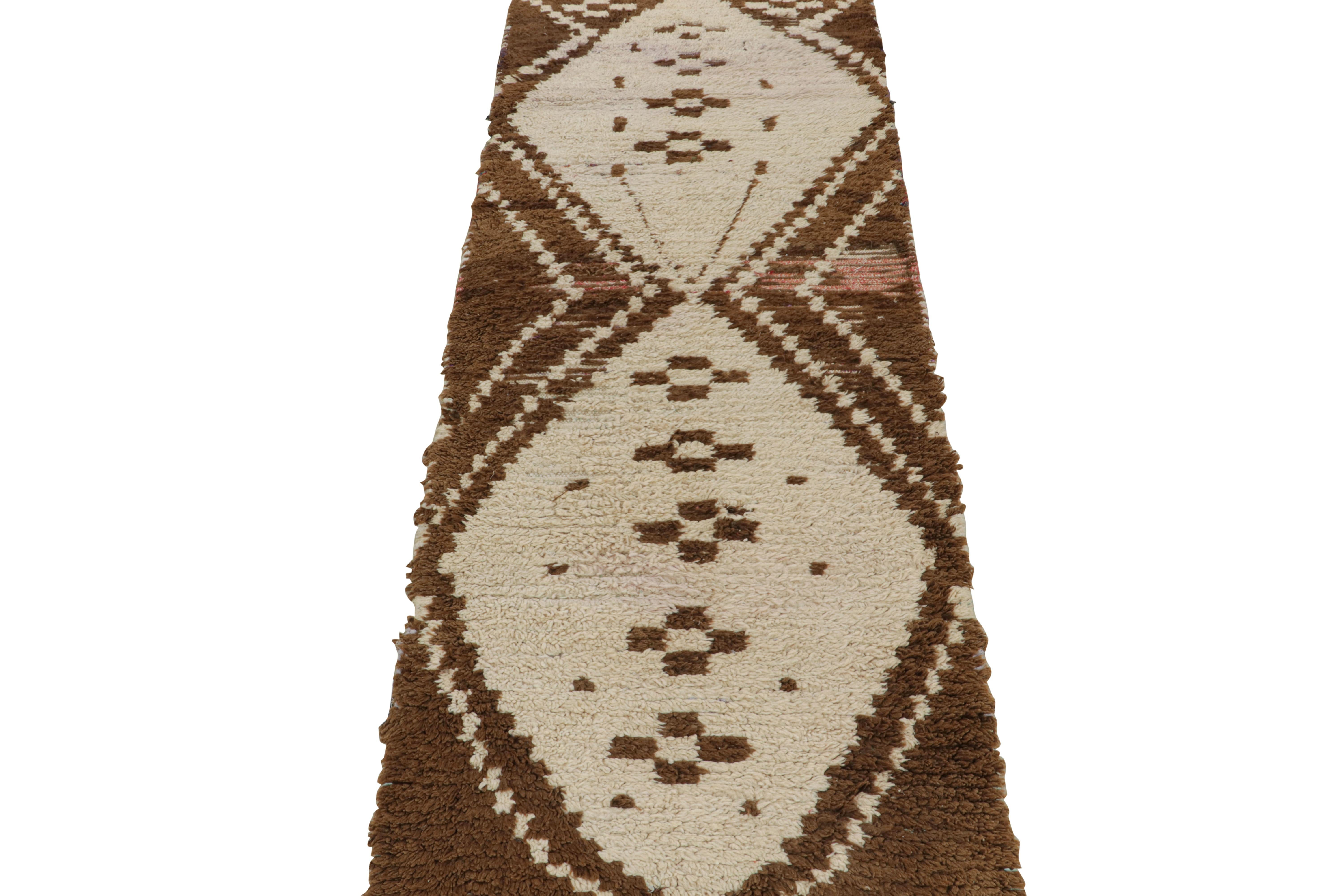 Hand-Woven 1950s Azilal Moroccan runner rug in Beige-Brown Tribal Patterns by Rug & Kilim For Sale