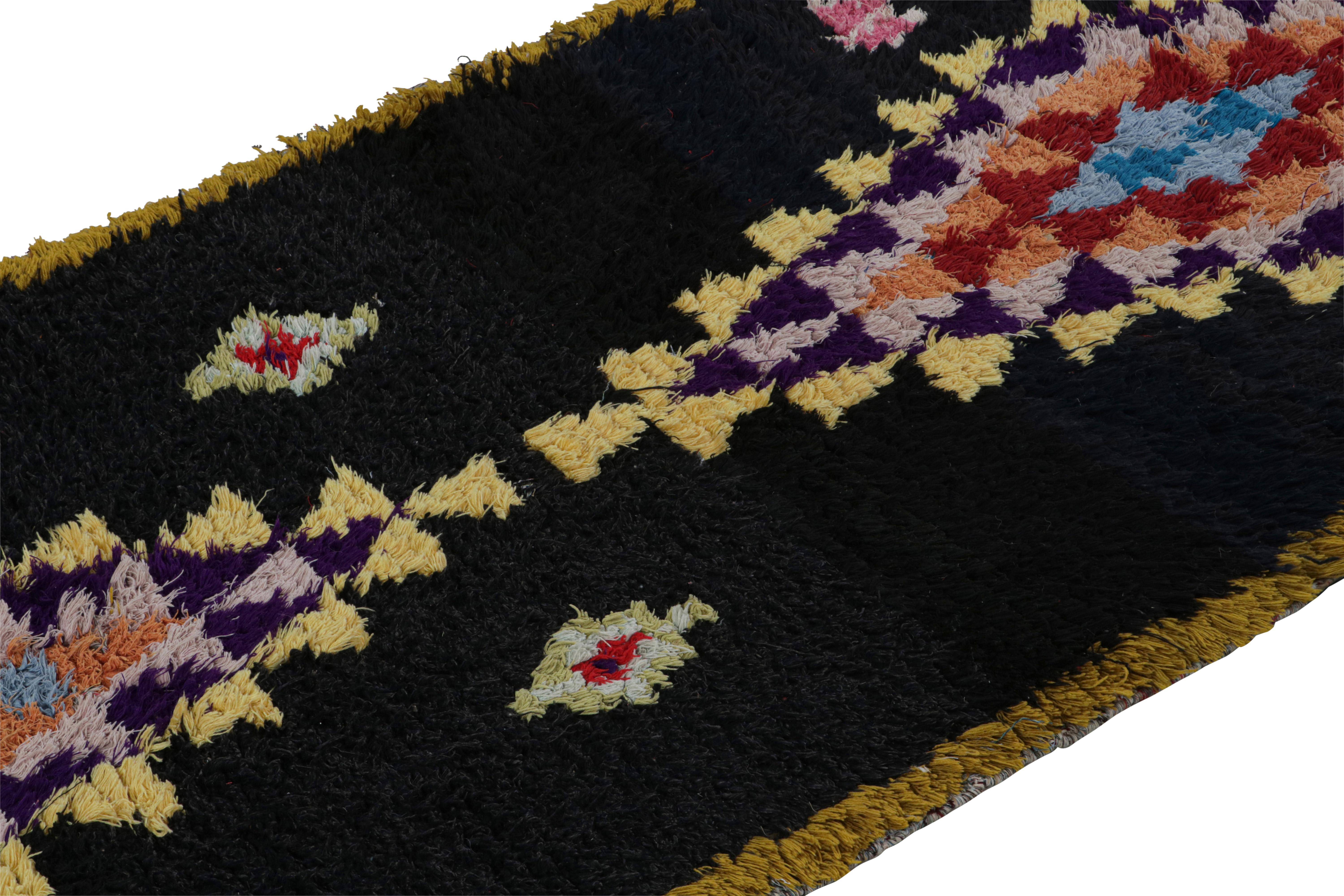 Hand-Knotted 1950s Azilal Moroccan runner rug in Black with Medallion Patterns by Rug & Kilim For Sale