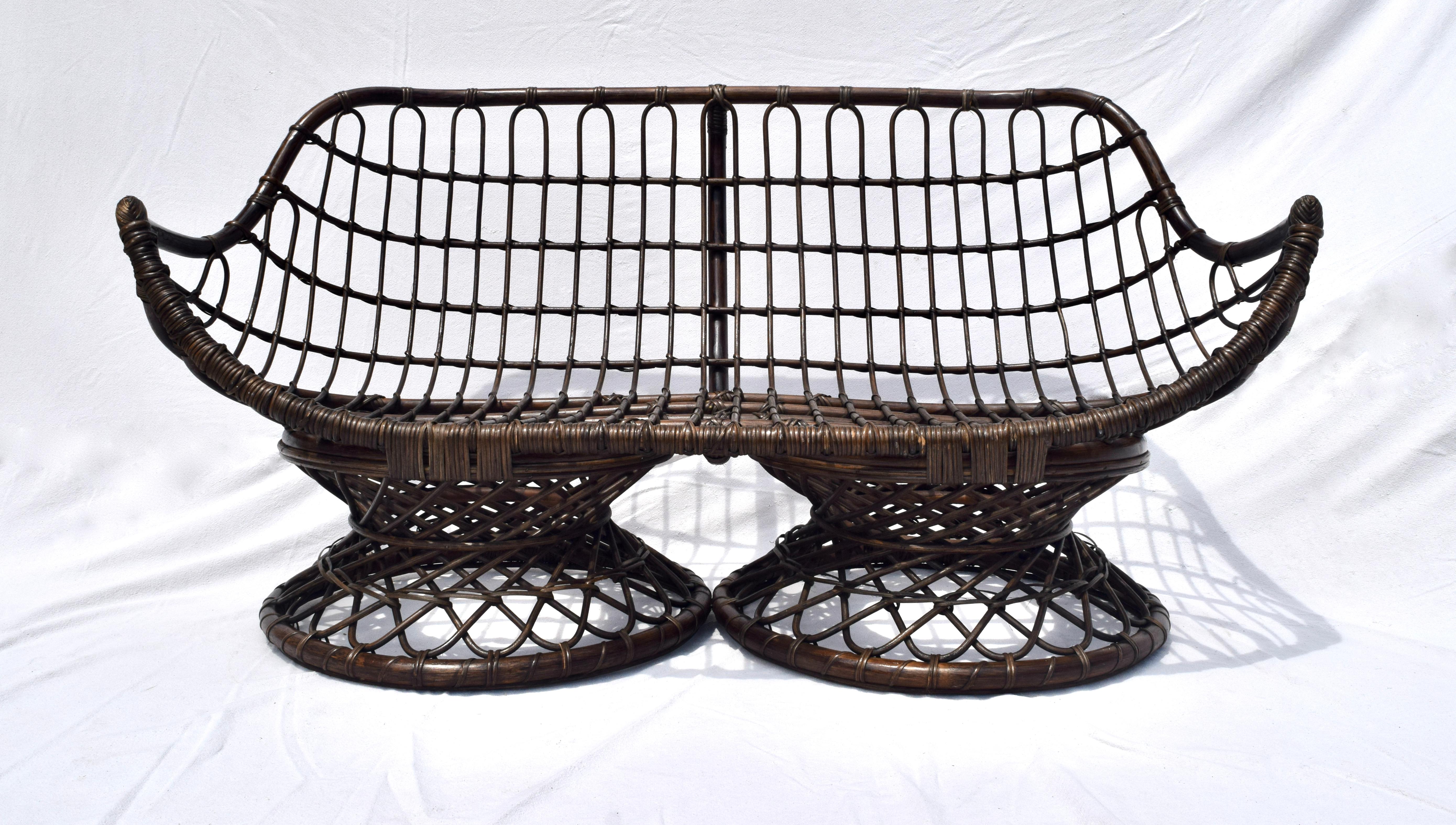 A bent bamboo, rattan sofa settee, circa 1950s. Scarcely seen and in excellent vintage condition. 
 